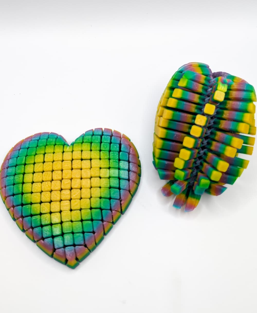 Such a great fidget! So satisfying. Printed in Panchroma Translucent Rainbow.