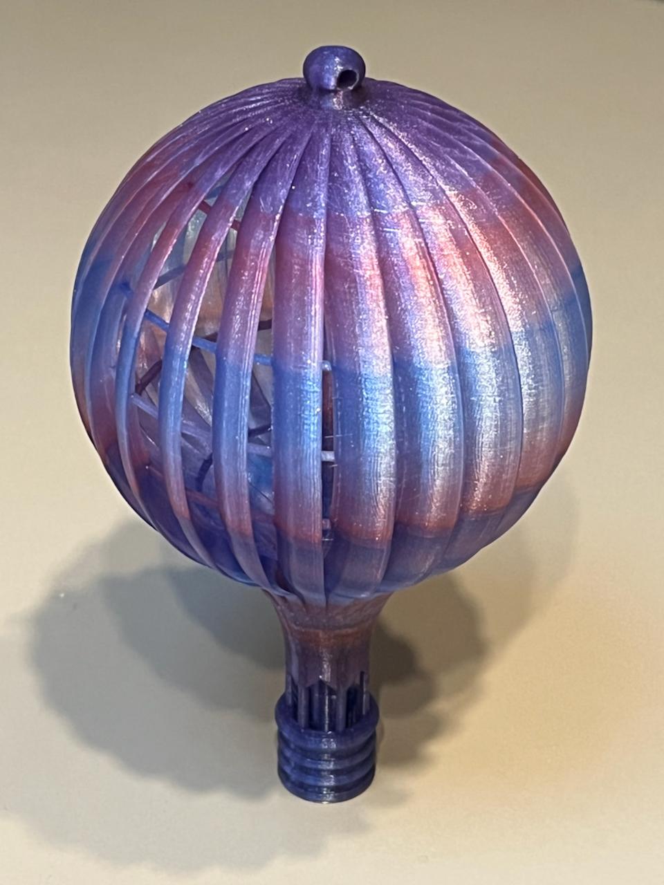 Wind Spinner Balloon - Printed in Nebula Multicolor.  This model is what pushed me over the edge and inspired me to purchase a 3D printer.  The print turned out great.  Had to scale it to 95% because of the height.   - 3d model