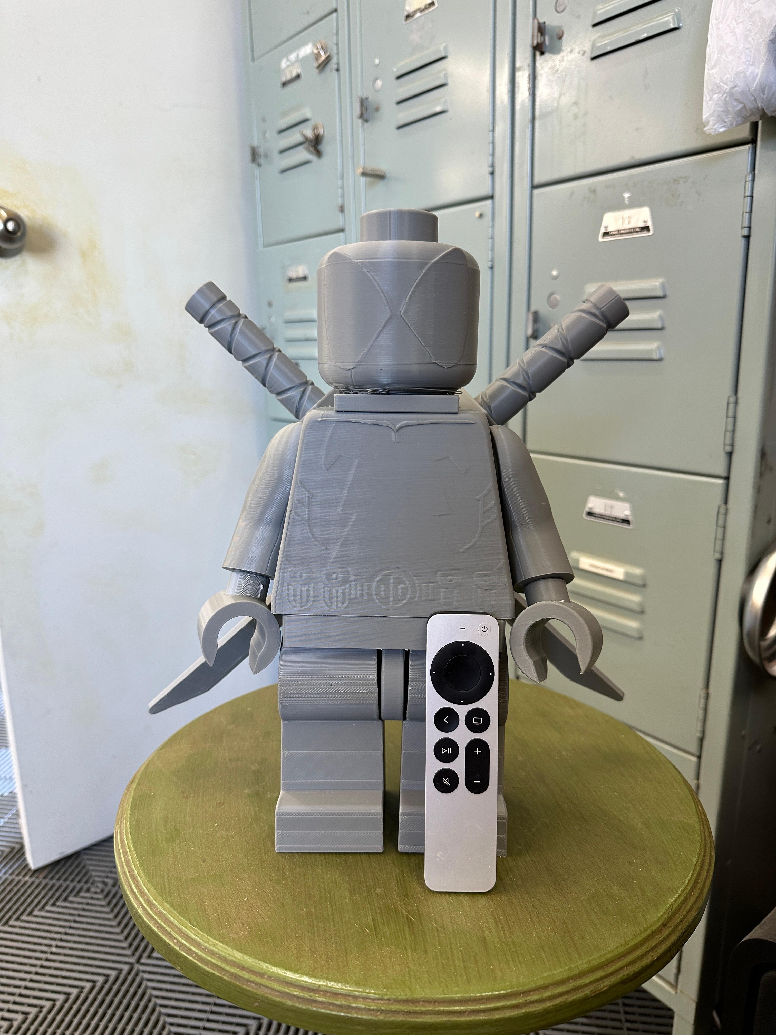 Deadpool LEGO STL file - 800% blowup. Apple TV remote for scale. Needs some sanding and touch up followed by some paint. Great build! - 3d model
