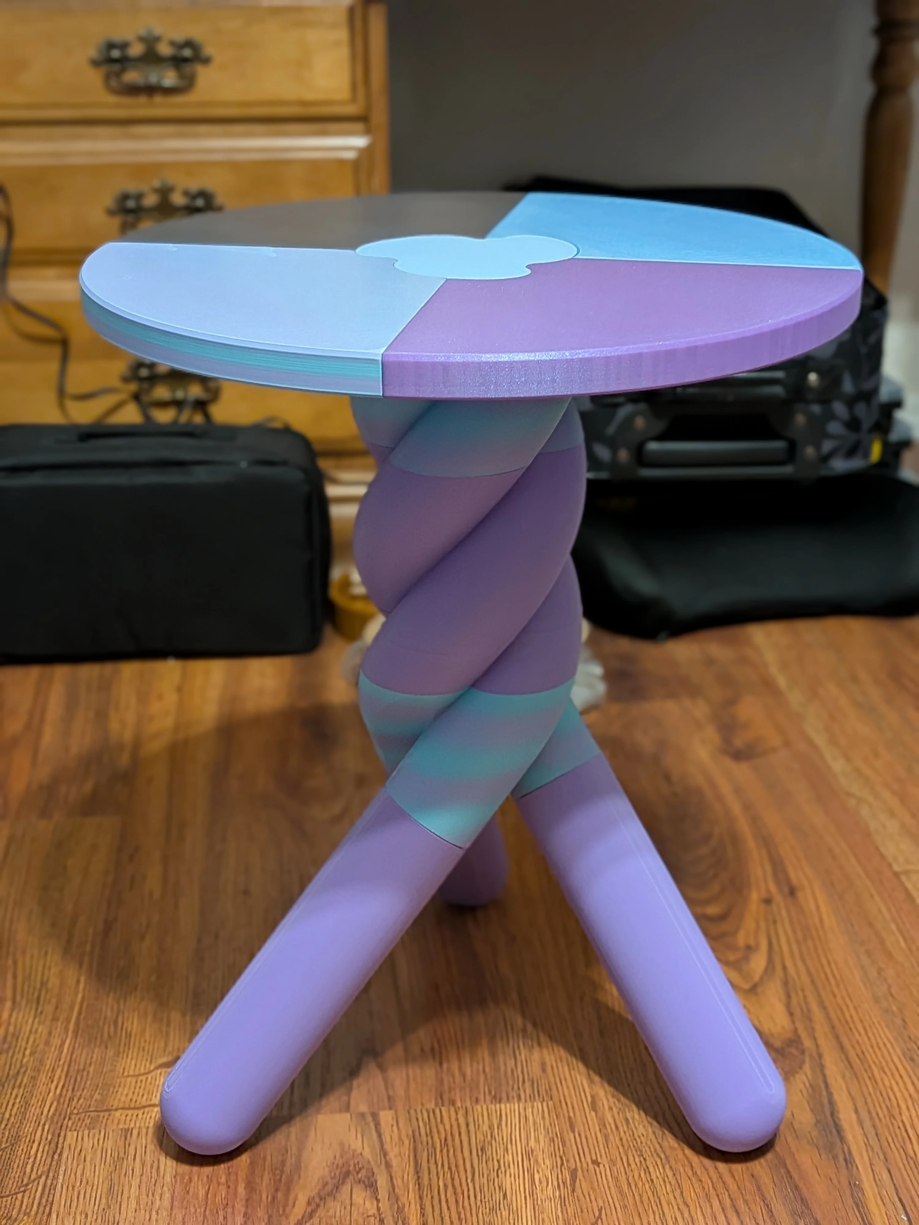 Very easy print, love how it turned out! Originally the top 4 pieces matched (2 and 2) but I failed to realize the tabletop part prints "upside down" so the part touching the bed is the color that will show when assembled. Using filler filaments for the bottom half led to some inconsistent coloring for me but that's on me! No issues with Bambu settings, love the turnout! (Little Jesus for scale)