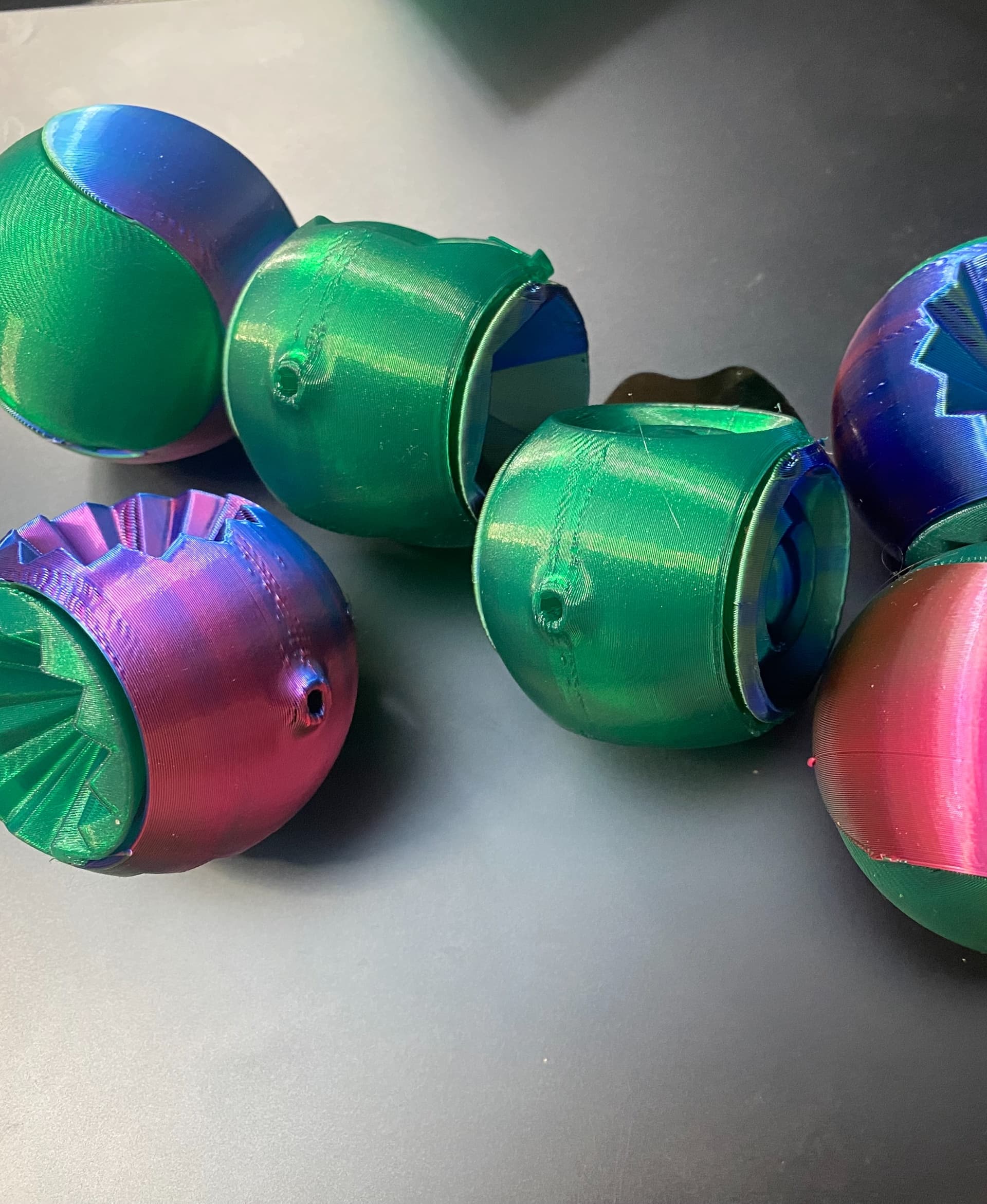 Printed in Prusament Opan green and AceReddy blue/green/red tri-color PLA. My experiment with Hatchbox Transparent Blue was a failure, probably due to printer tuning issues.