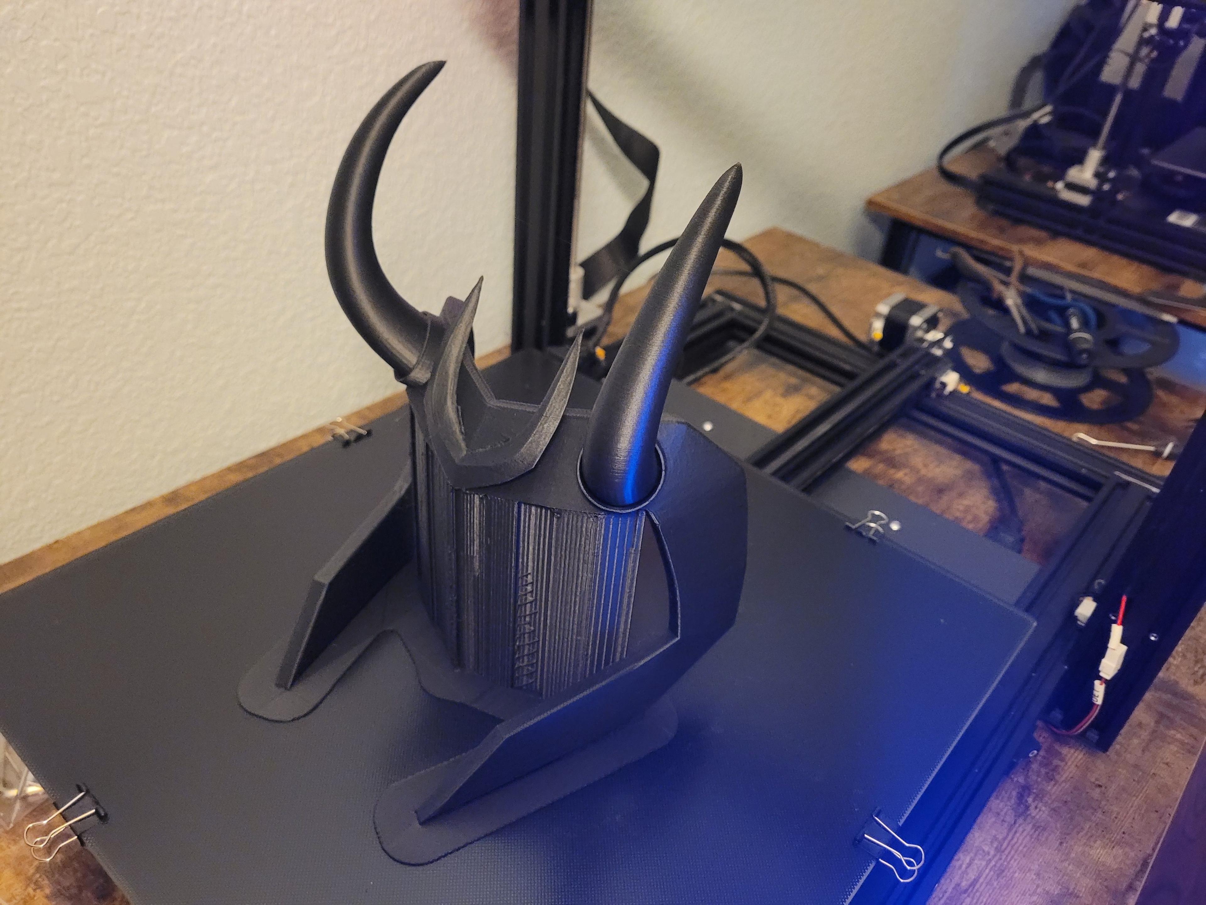Loki Headpiece - Printed at 100% scale.

Printed on a Sovol SV03
Resolution/Layer Height: 0.2
Infill Density: 5%
Supports: 3% infill
Support Overhand Angle: 70 Degrees

The picture shows how the print after it was completed. No supports had been removed yet, and the orientation was left as it was printed. 

It turned out great. I will upload post-processing photos at a later date.

 - 3d model