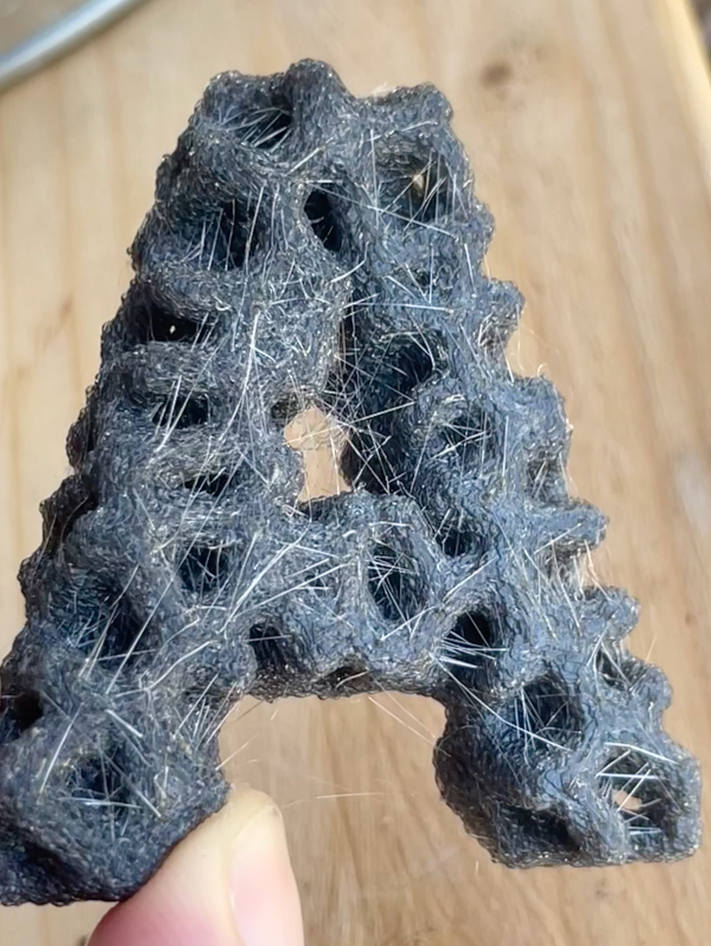 Wanted to try this out with fuzzy skin, noticed it was stringing early on and intentionally allowed it to happen, interesting look.
It has a sparkling effect hard to capture in a photo.
