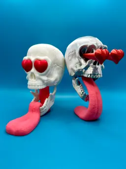 Skull in Love and also pictured the all new Jaw Drop.
Easy to print in parts to choose your own colors and super easy assembly. 3d model