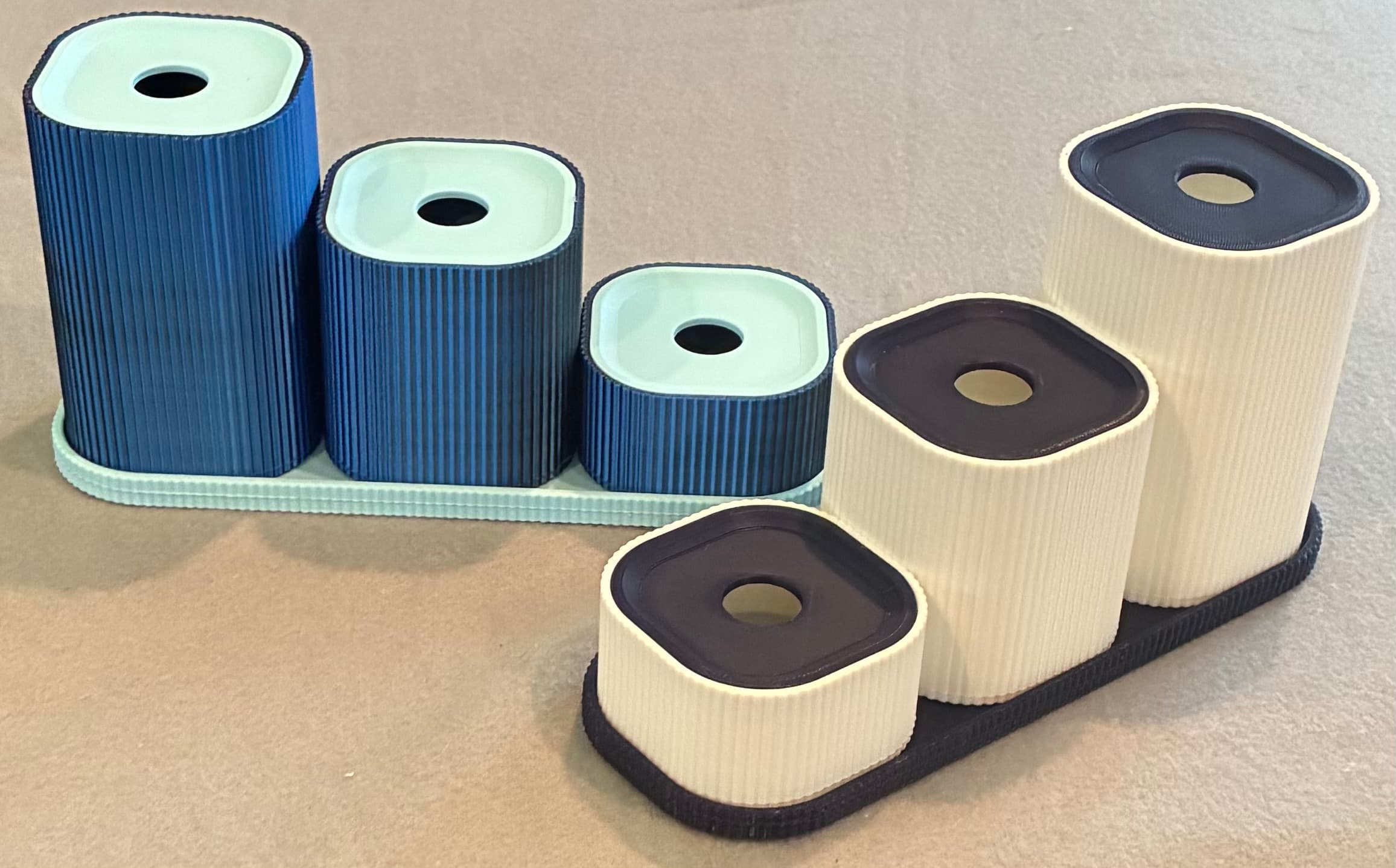 Two makes: Amolen PLA Silk (Blue/Black) with BL PLA Matte (Sky Blue) and BL PLA Jade White with Voxelpla PLA Blue.