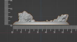 Oval Miniature Base with Rocks and Skull – 67x38mm Presupported 3d model