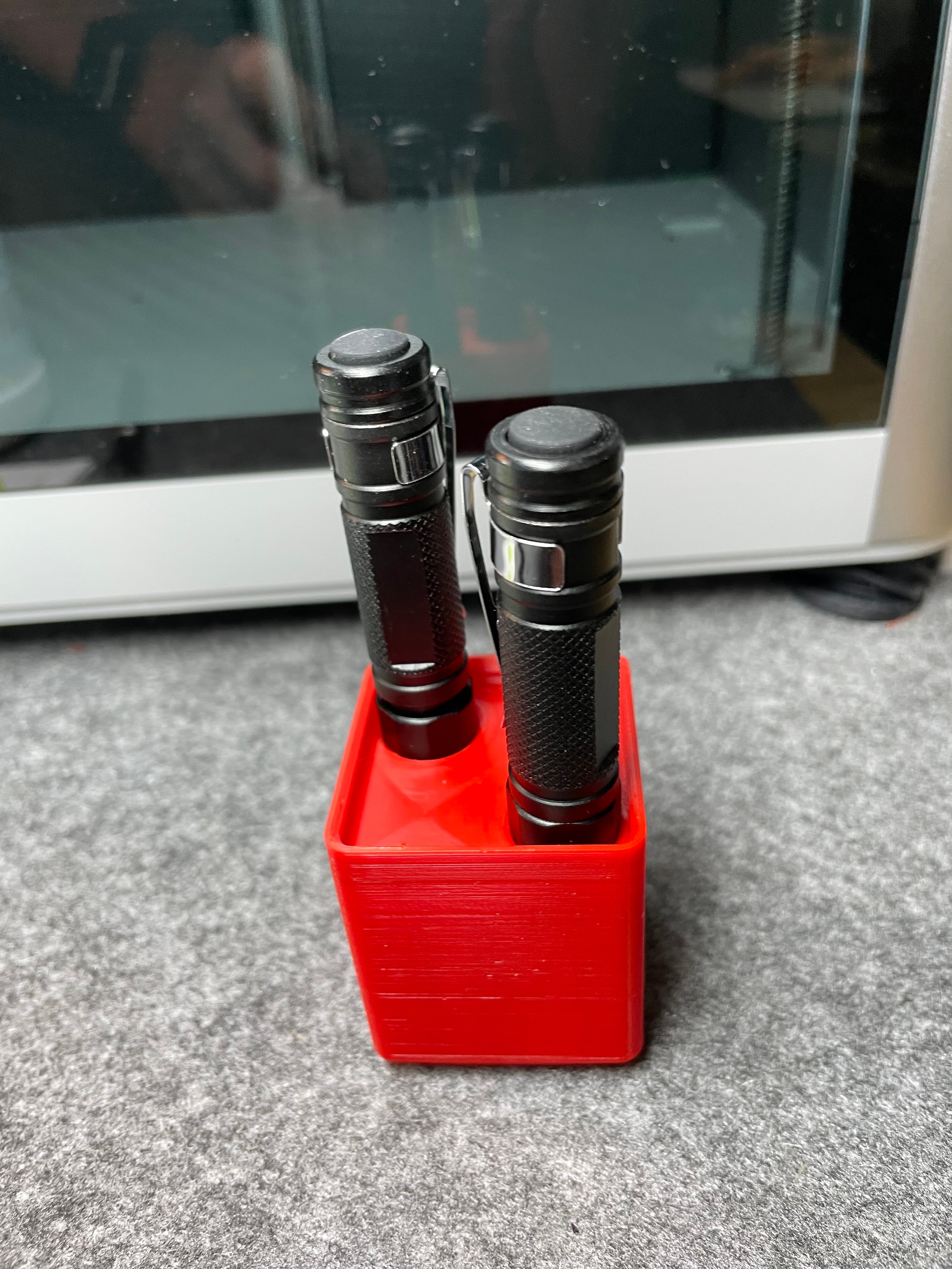 Gridfinity Basic 2 x 15mm holes 1x1 - Useful for laser pointers and penlight torches, etc. - 3d model
