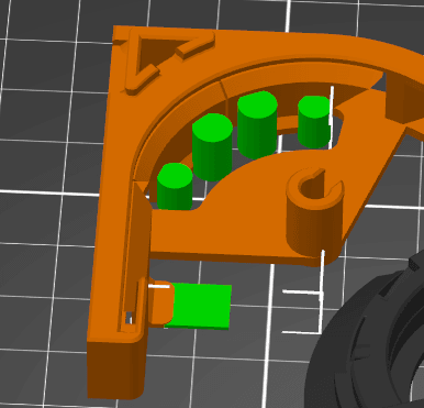 I had bed adhesion problems with the base part, where the modeled-in-supports would break loose. I added some shapes/material in Prusa Slicer to increase adhesion surface area and strengthen the supports. These print fine now, and it only adds a few minutes to the print.
