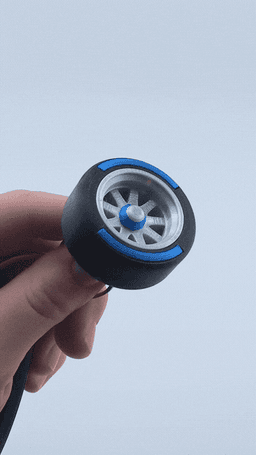 Spinning F1 Inspired Tire Keychain 3d model