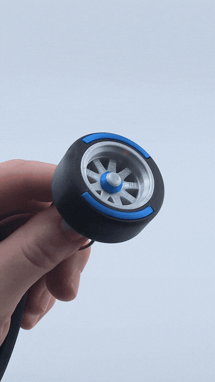 Spinning F1 Inspired Tire Keychain 3d model