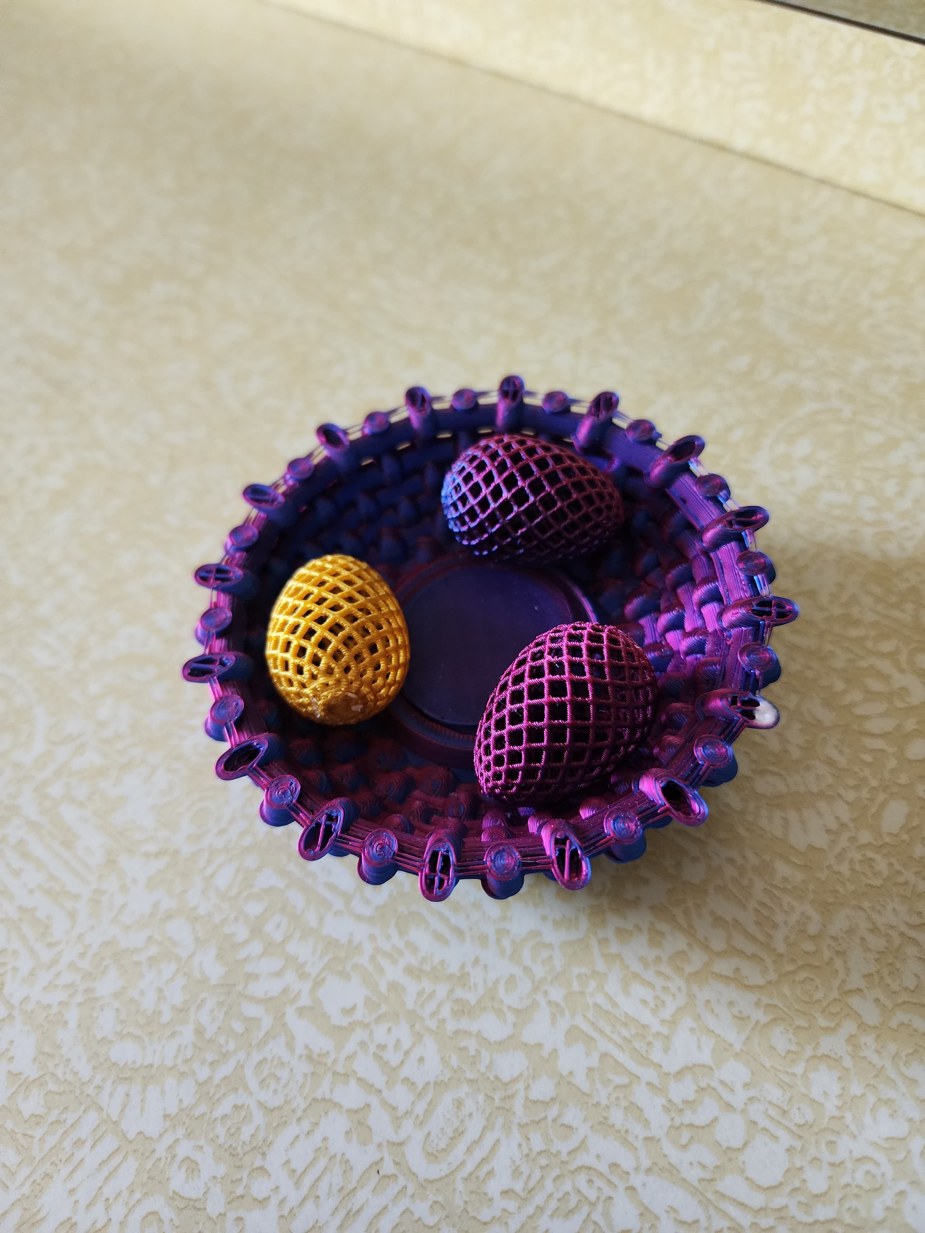 Had the print of an egg fail early but it was too beautiful to recycle. Decided to make it a bird's nest and add a few smaller eggs to it. Looks great and my wife loves it.