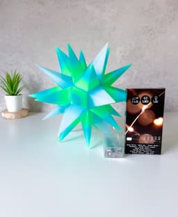 This beautiful star is printed in crystal pla from 3DHOJOR. Ruven bals gave me the advice to print it in 10 walls. (It dont print actually 10 walls) At some point you need focus and patient to assemble it. In total i broke 2 parts. I think its better not to use Polyterra but polylite instead, if you are gonna use Polymaker. Or if you want to use esun, better pla+. The light i bought from action (store in the EU) you can also buy on amazon these kinda lights. I am happy with the result! 3d model