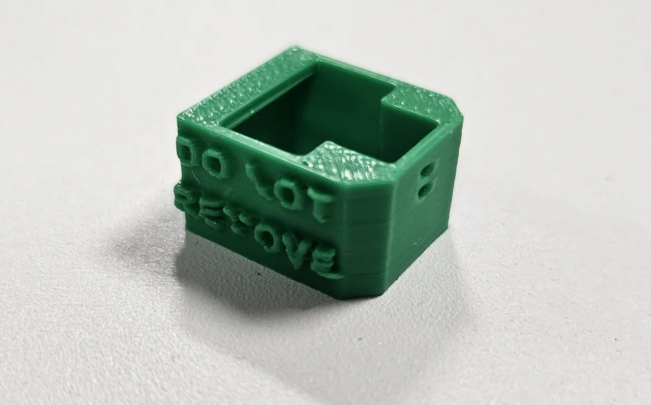 RJ-45 Lock with warning engraved and embossed 3d model