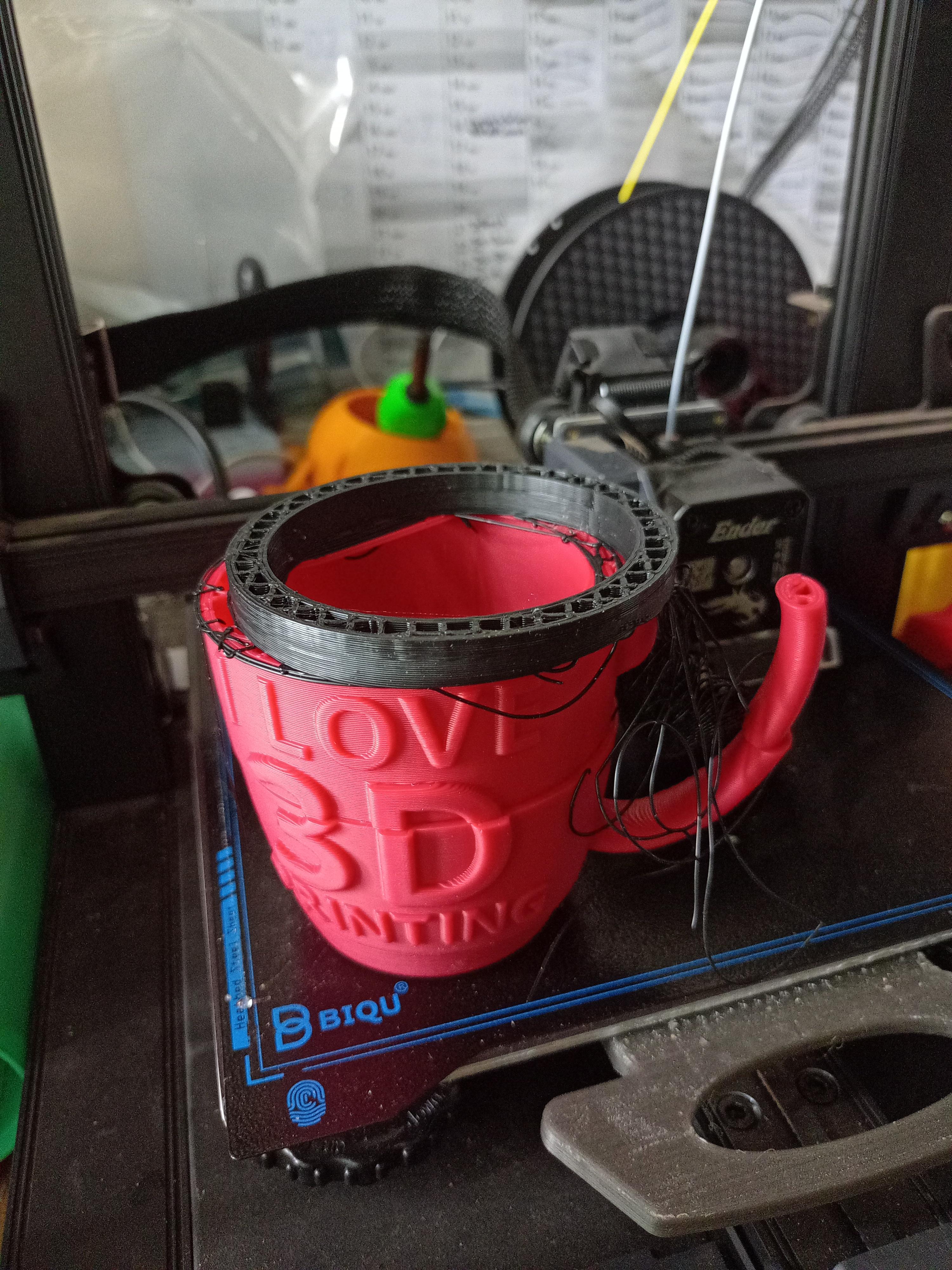 I Love 3D Printing Gag Gift Mug - Sliced for my 0.6mm nozzle, printed on my 0.4mm nozzle by accident.
So 0.4mm layer height on a 0.4mm nozzle.
Filament run out just before a power out of 2 hours.
Print came loose from the bed.
So here we have a true masterpiece. - 3d model
