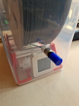 Filament holder plug for 3D filament dryer box 3d model