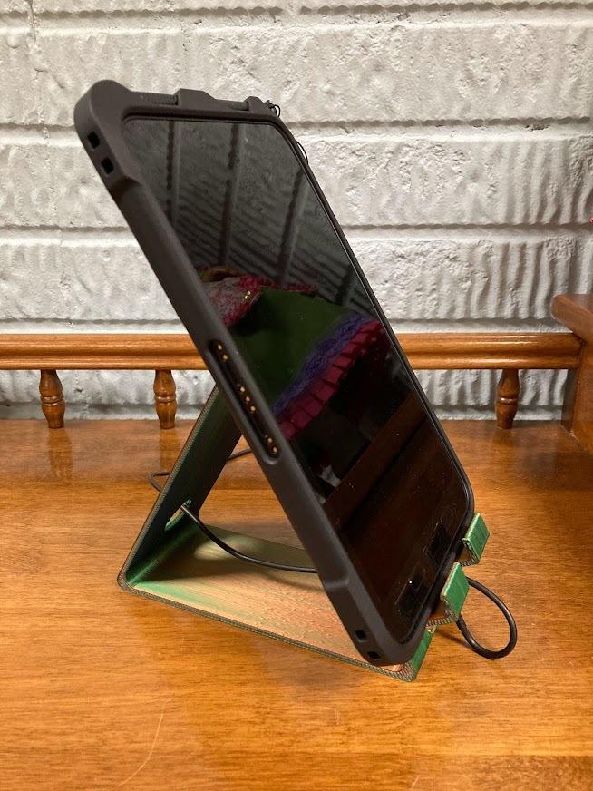 Tablet holder with access for power cord 3d model