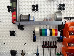 Tape reel shelf rod holders 3d model