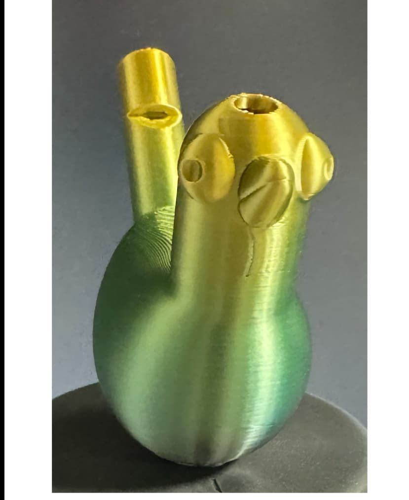 Printed on a Bambu P1S using TTYT3D `Silk Shiny Fast Color Gradient Change` PLA