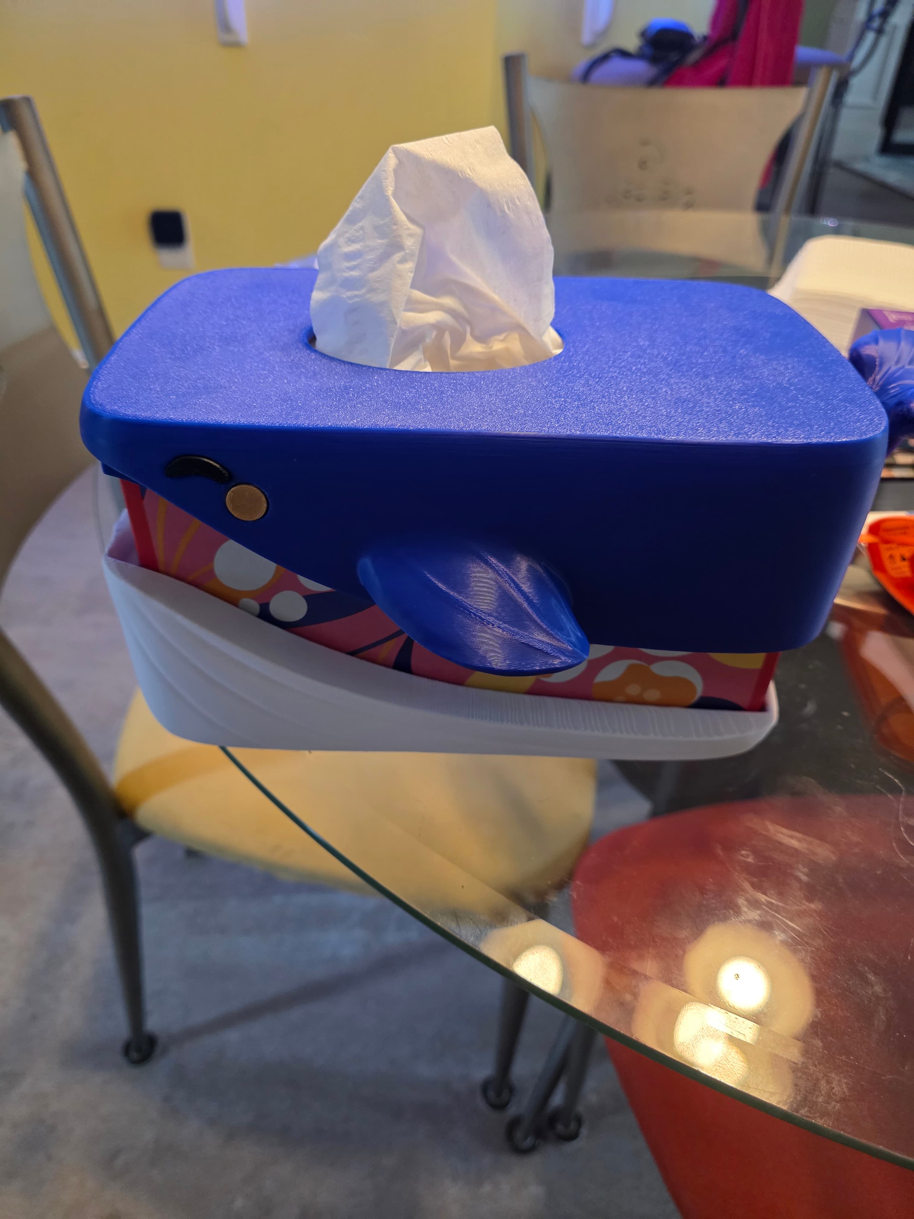We love the design! But as some others noted a taller version would be nice. I'm going to hunt around for a smaller box, but with allergies in this house, we go through a big box frequently. I'm sure its a US thing to have over sized boxes. But the height and width are the same on our boxes. Might be able to slice and stretch it to fit. Otherwise love it!