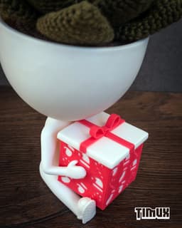 ROBERT PLANT WITH A CHRISTMAS GIFT BOX 3d model