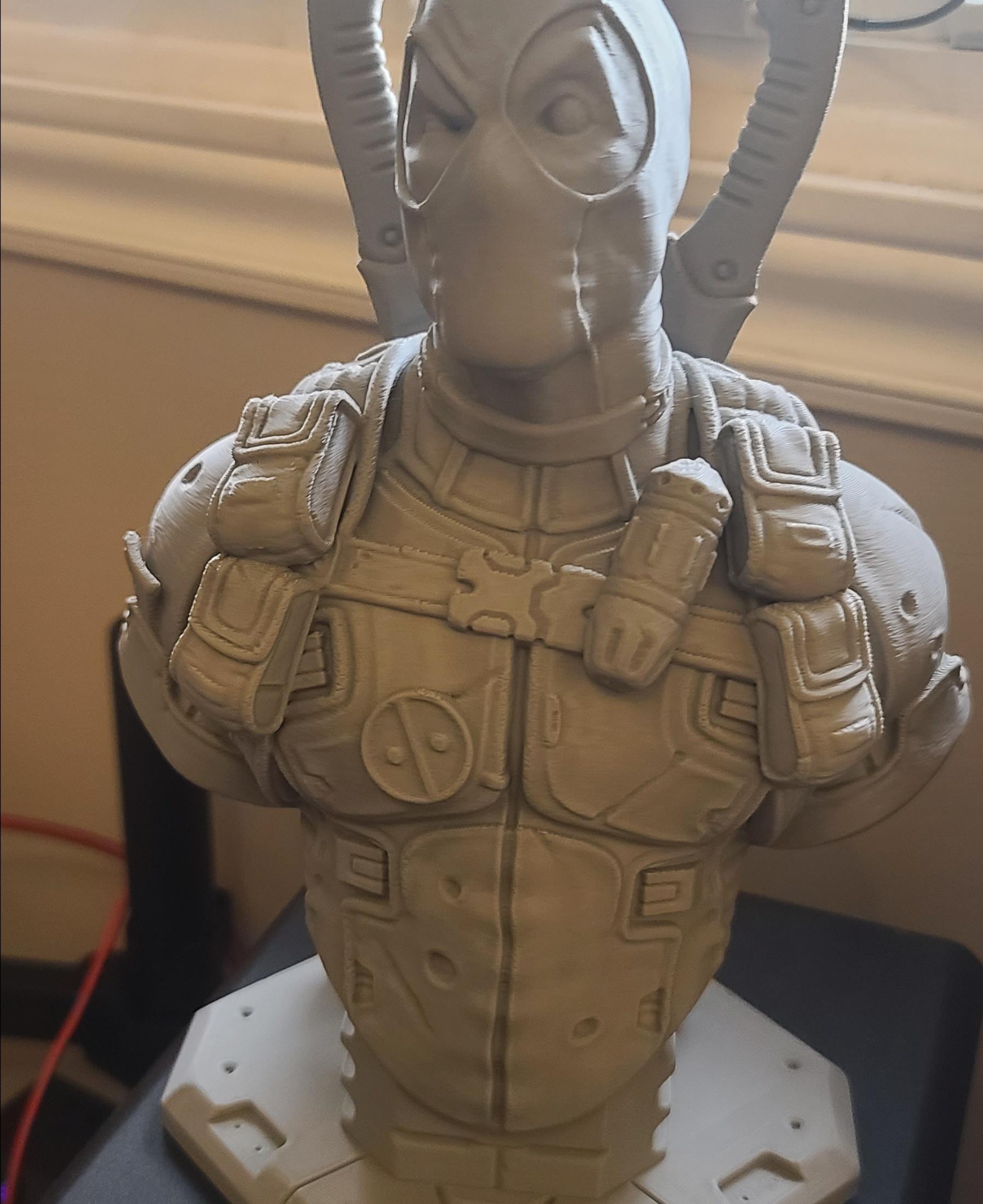 Deadpool bust (Remastered Supportless Edition) (fan art) - This Thang is insanely cool. Have to stop printing other stuff long enough to paint it now! Scaled to 250mm (10") height and printed on an FDM at 0.2mm resolution, 5% infill (only because of the base) - 3d model