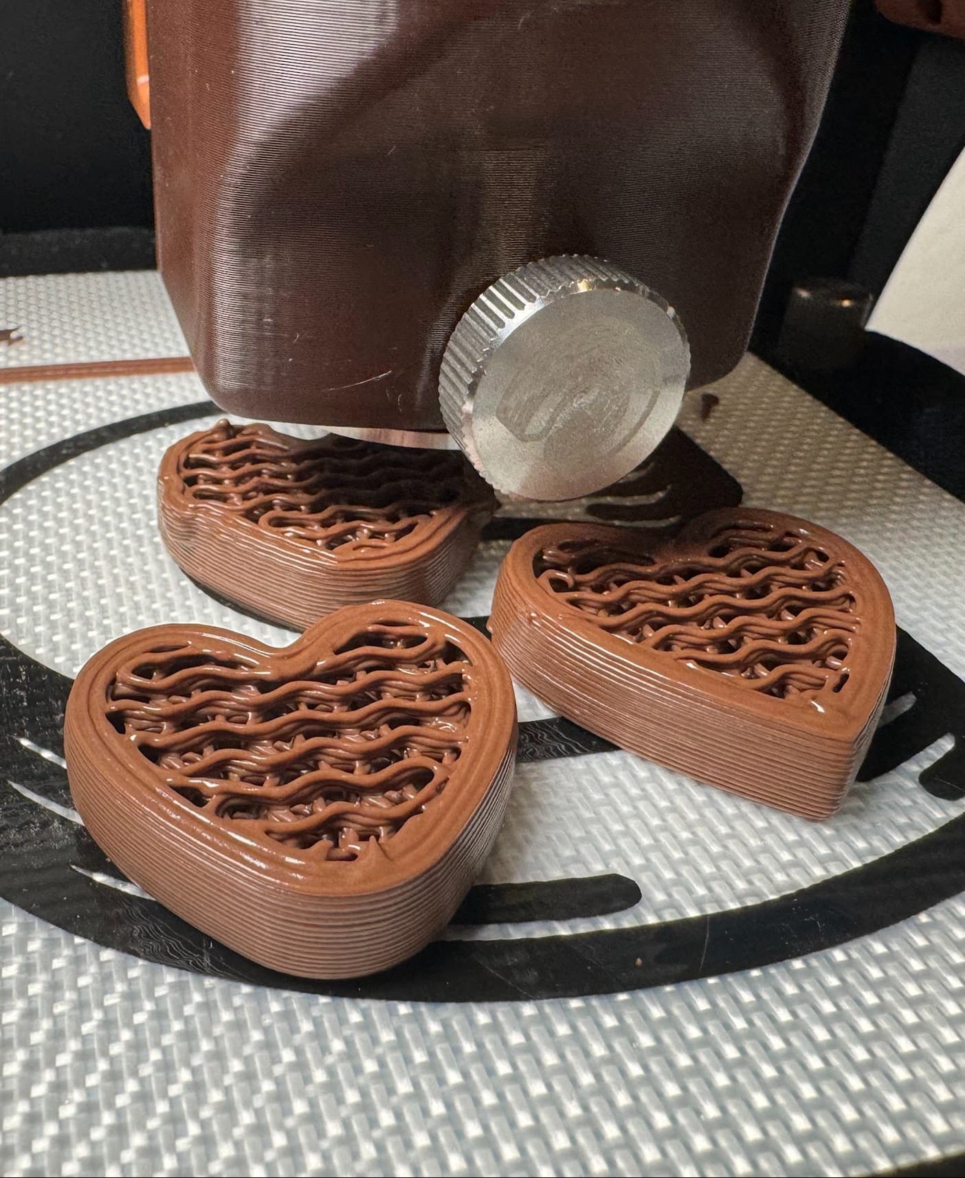 3 milk chocolate hearts mid-print with 30% gyroid infill