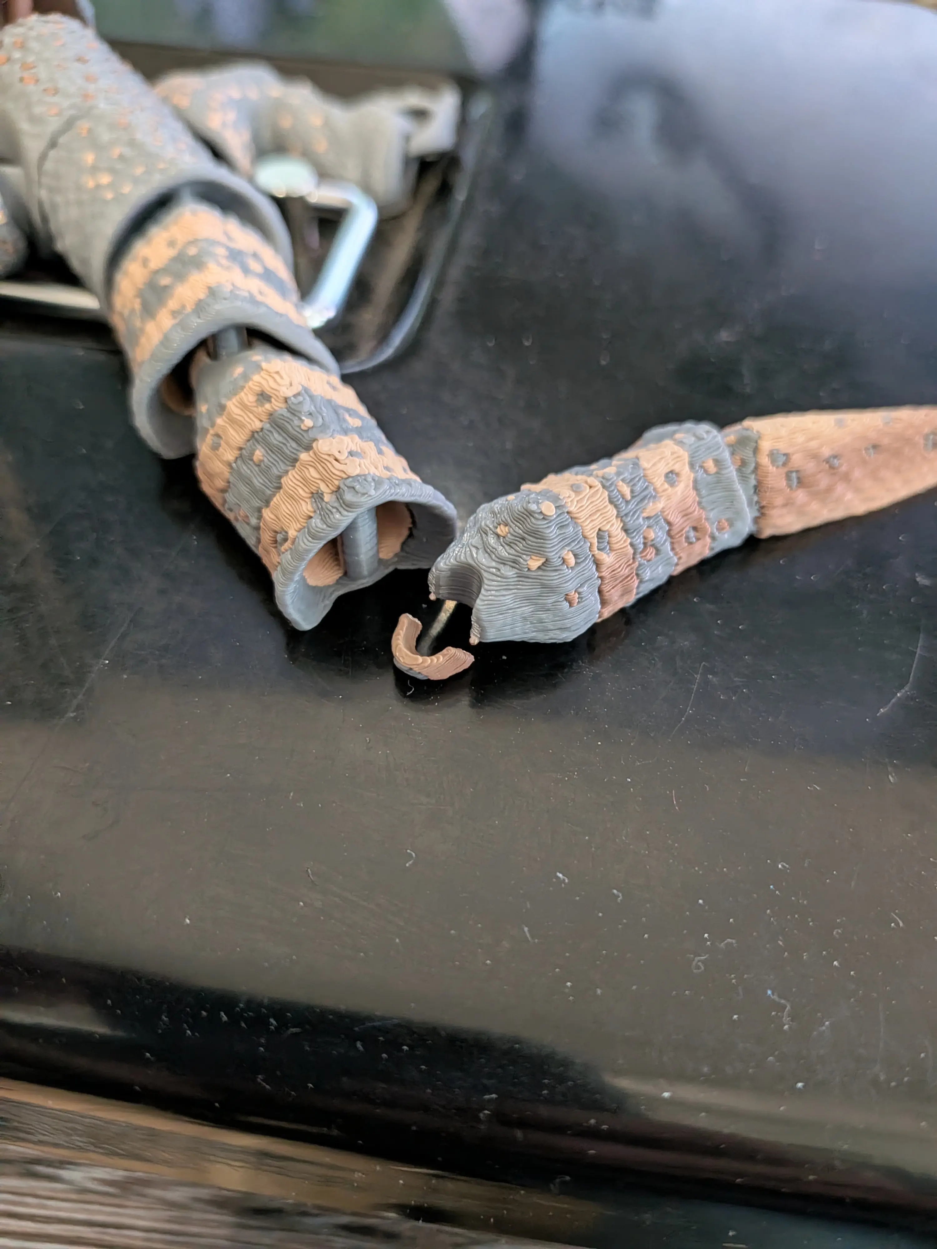 Printed this model twice. With different colors and filament brand. It broke both times at the same area. A color change/seam in second to last joint of the tail. That should be fixed before printing so there are no color changes or seams in the link.