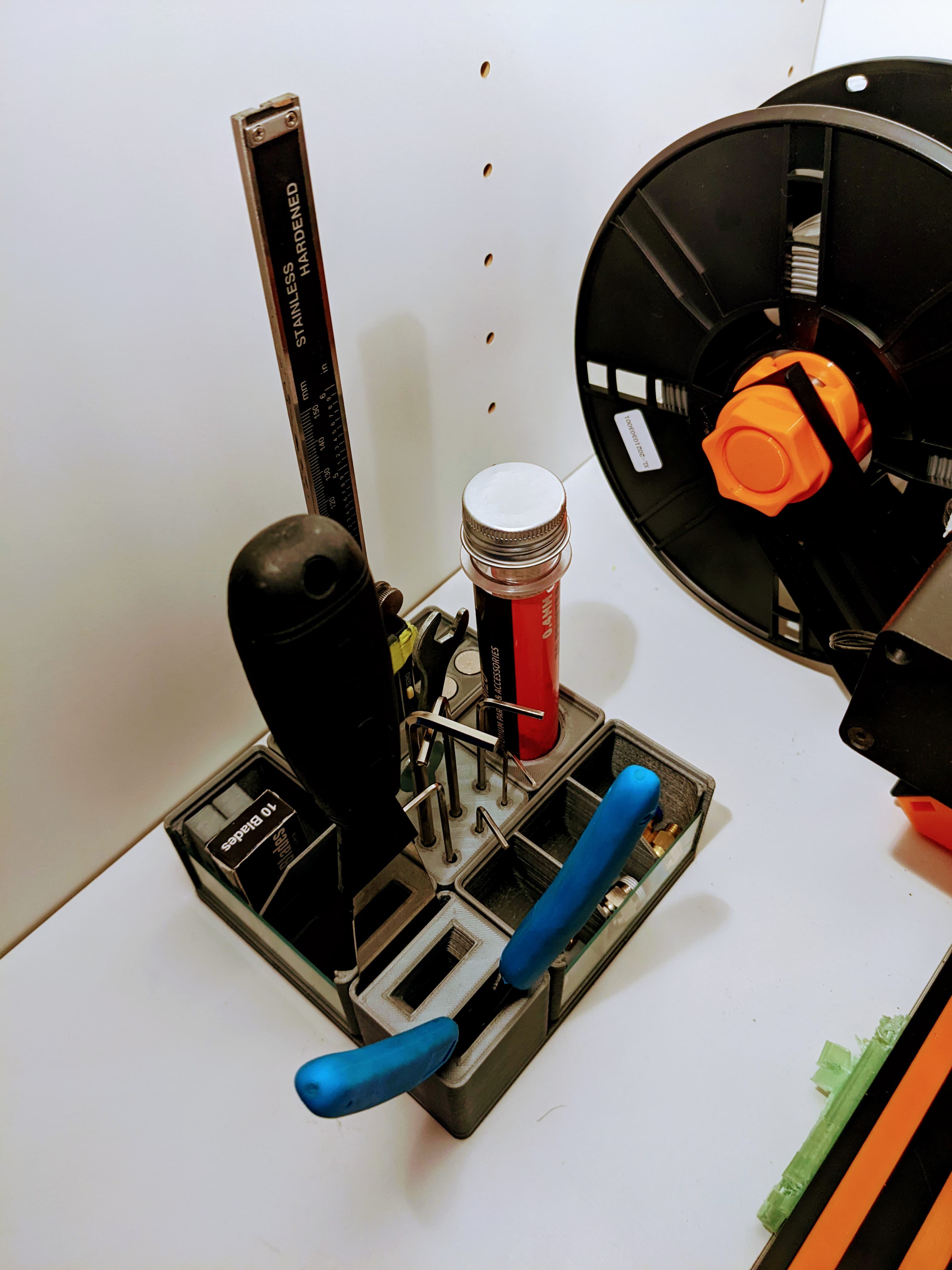 Storing nozzles, couplings, and misc tools for my printer.