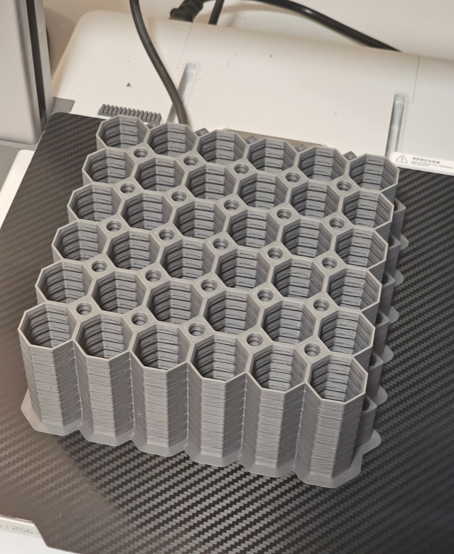 Awesome first print,
On Sunlu APLA grey, 70 Bed 230 hotend.
Coped well with both 125% and 166% print speed after tray one with a 5mm skirt which shaved almost 5 hours off the orint time.