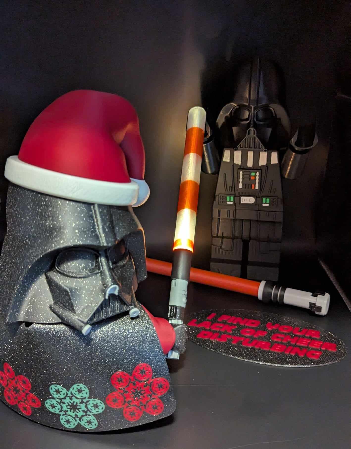 I find your lack of cheer disturbing! Galaxy black and some added fun for this print with a light up saber too!