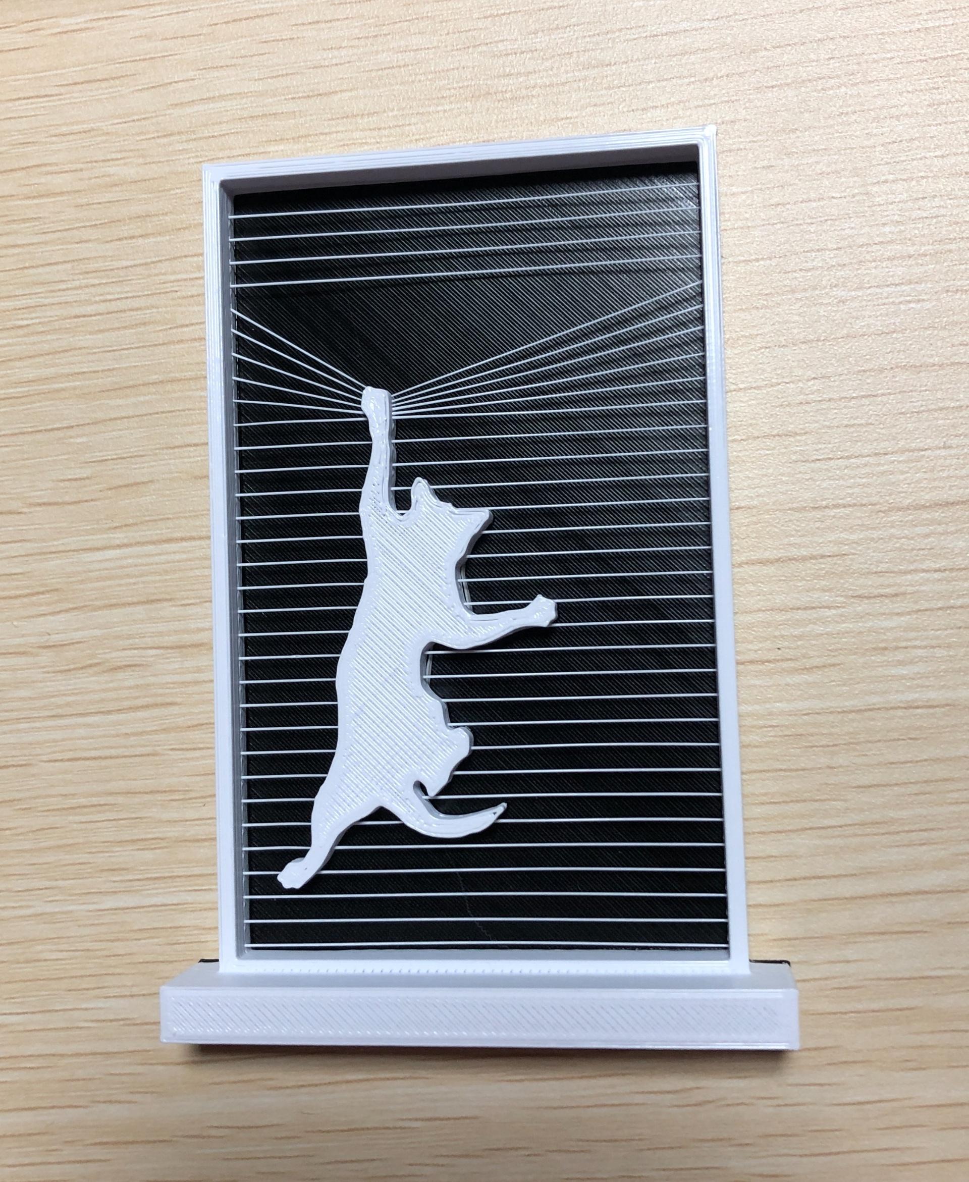 Hanging Cat Ornament - E3P using Cura slicer
sitting on dark background (same print) - 3d model