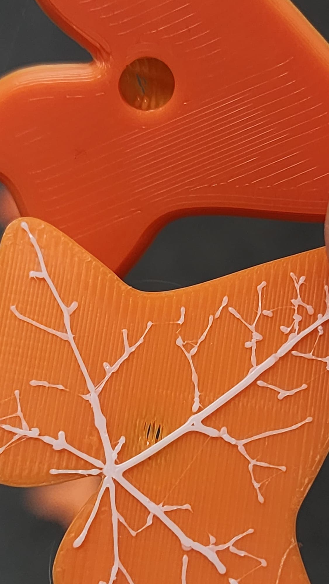Having an issue with this color for some reason.. I used both the lighter green and olive green with no issue, but this orange/red PLA+ has these gaps in the center of the leaf.. Anyone know how to fix this? Thank you in advance!