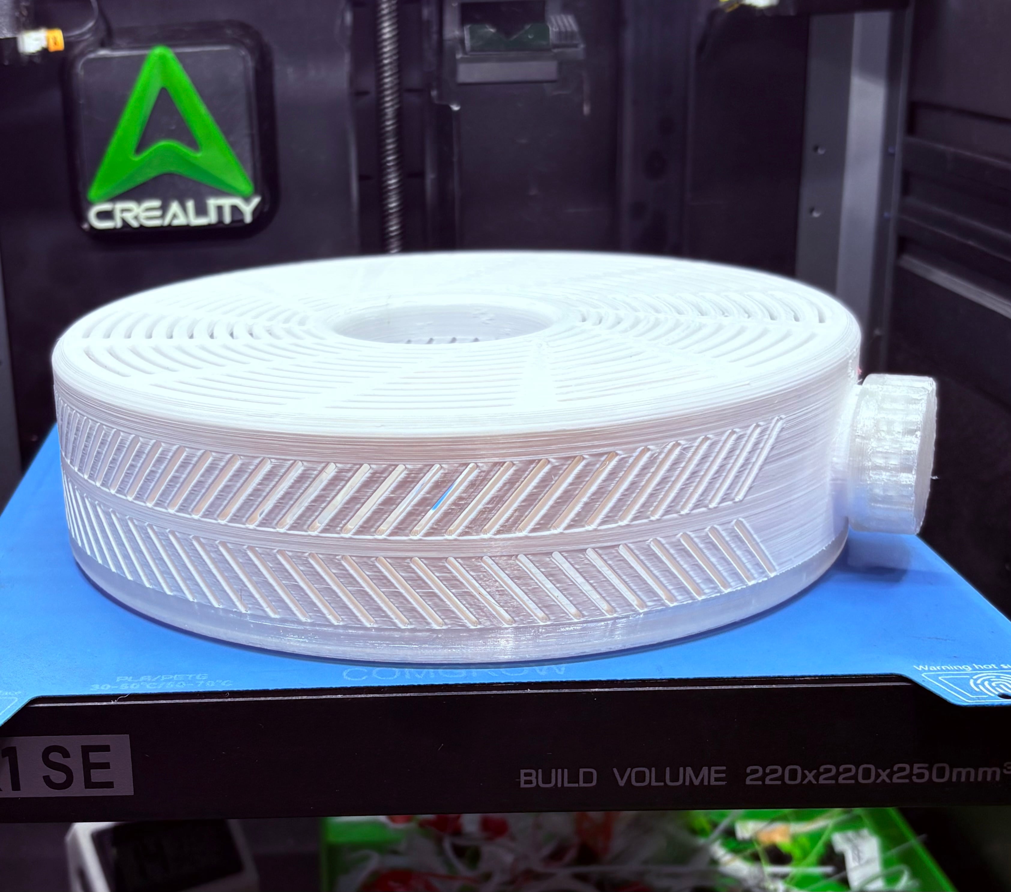 White and clear PETG. Came out great. I’m looking forward to trying it out.
