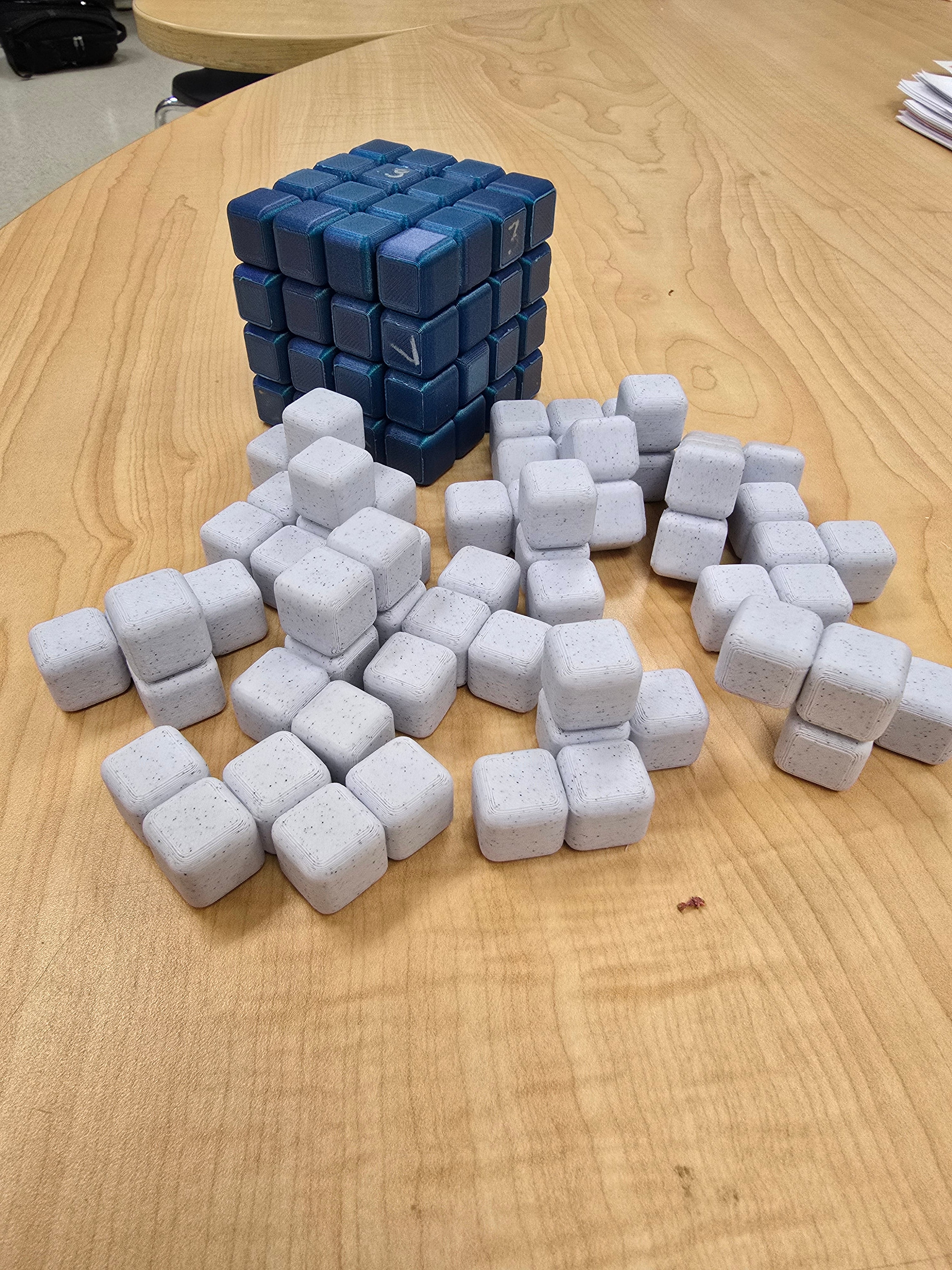 Printed some 4x4 puzzle cubes for students to sketch and learn about technical drawings. They have also become very popular to play with.
