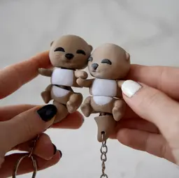 Baby Flexi Otters Magnetic Hand-Holding Companion 3d model