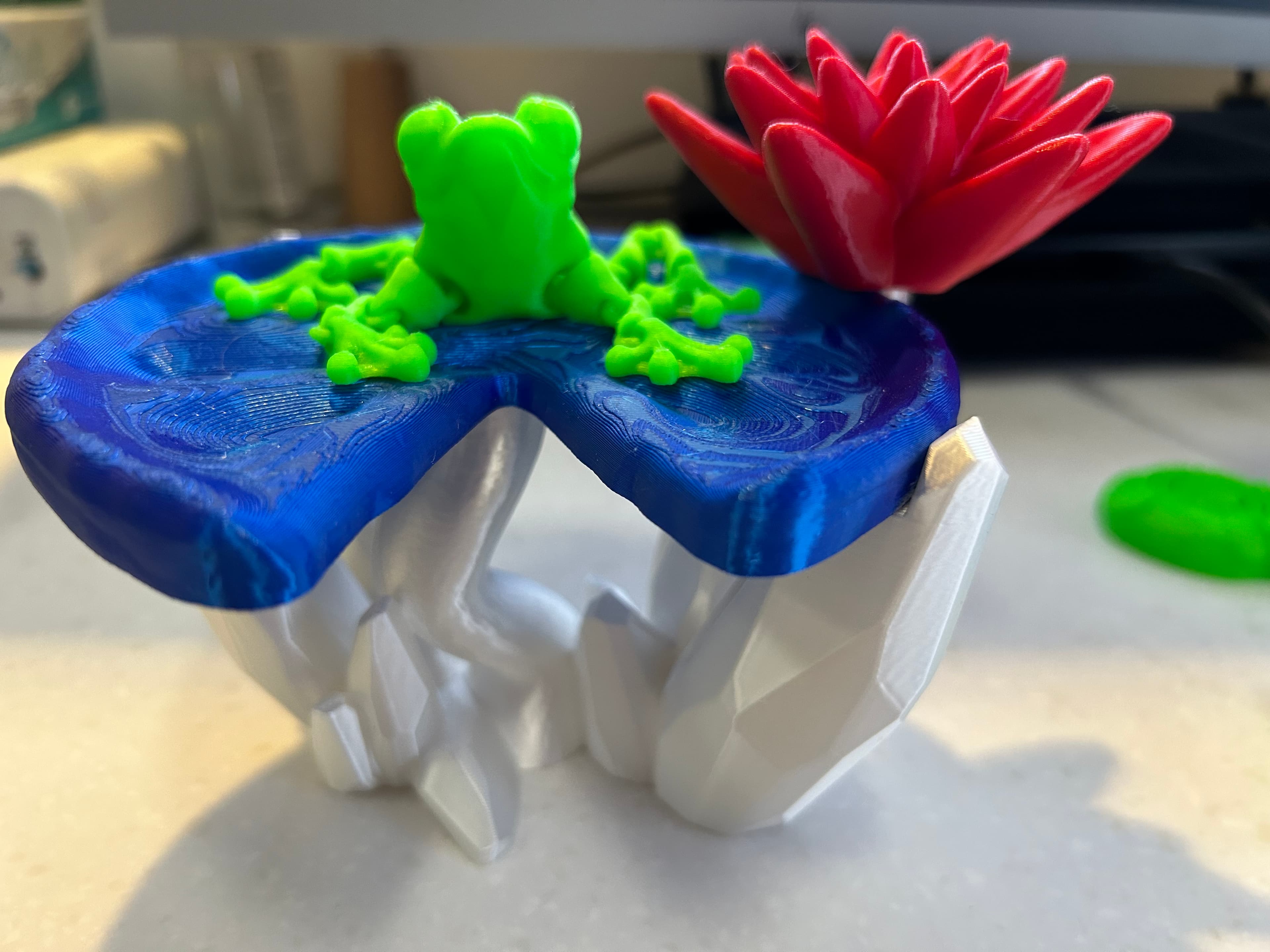 4th of July interpretation of the Crystal Lily Pad with a glow in the dark Cinder Frog.