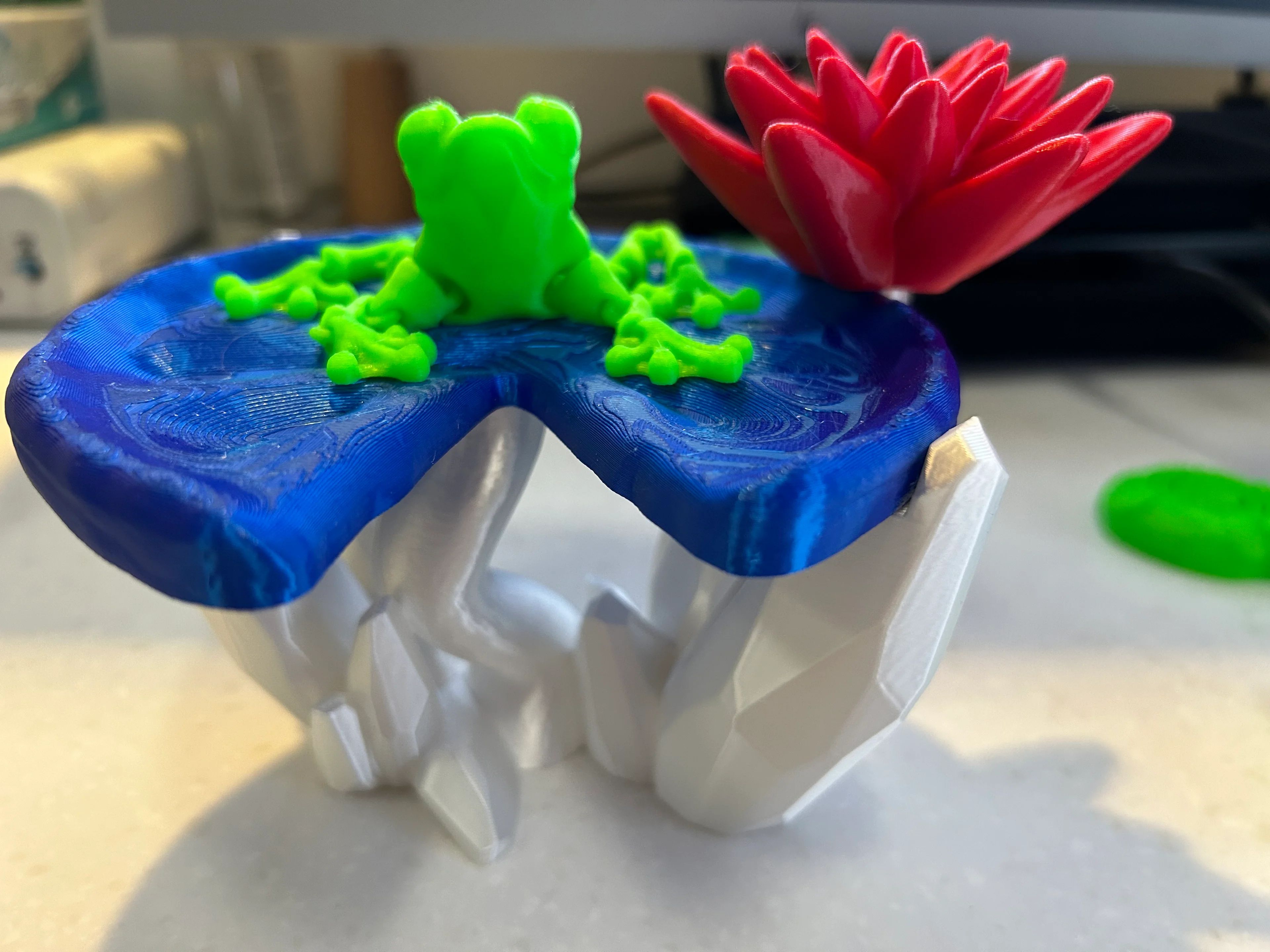 4th of July interpretation of the Crystal Lily Pad with a glow in the dark Cinder Frog.