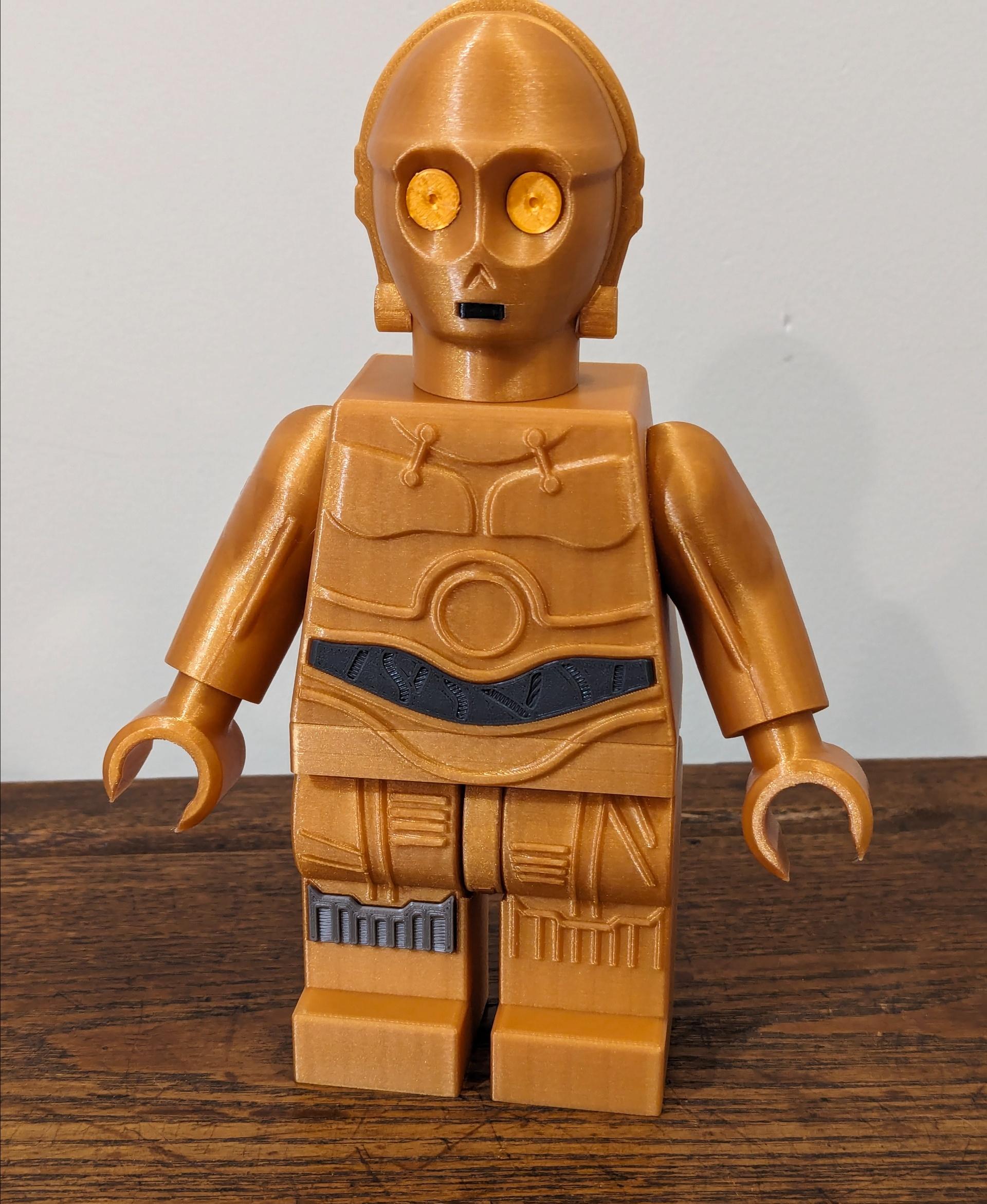 C-3PO (6:1 LEGO-inspired brick figure, NO MMU/AMS, NO supports, NO glue) - Printed in 
@AtomicFilament 
- True Gold
- Silky Sunset
- Gun Metal Gray

#Filamatrix
- Silver - 3d model
