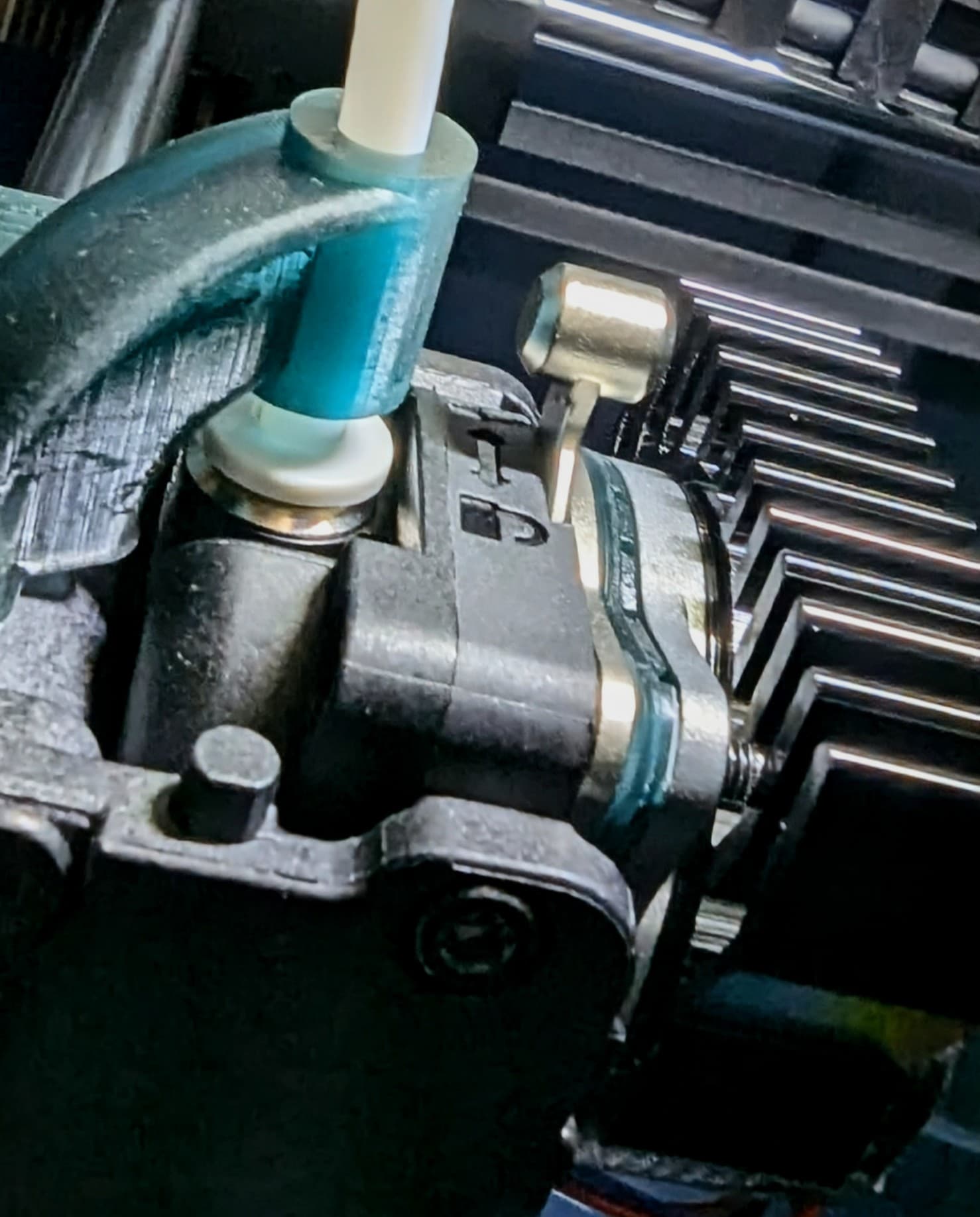 Printed with Elegoo ABS-like 3.0+ translucent resin with black and cyan pigments added from Monocure3D's CMYK dye kit. Finished the outside surface with clear Plasti-Dip for vibration dampening & a bit of thermal insulation before installing.