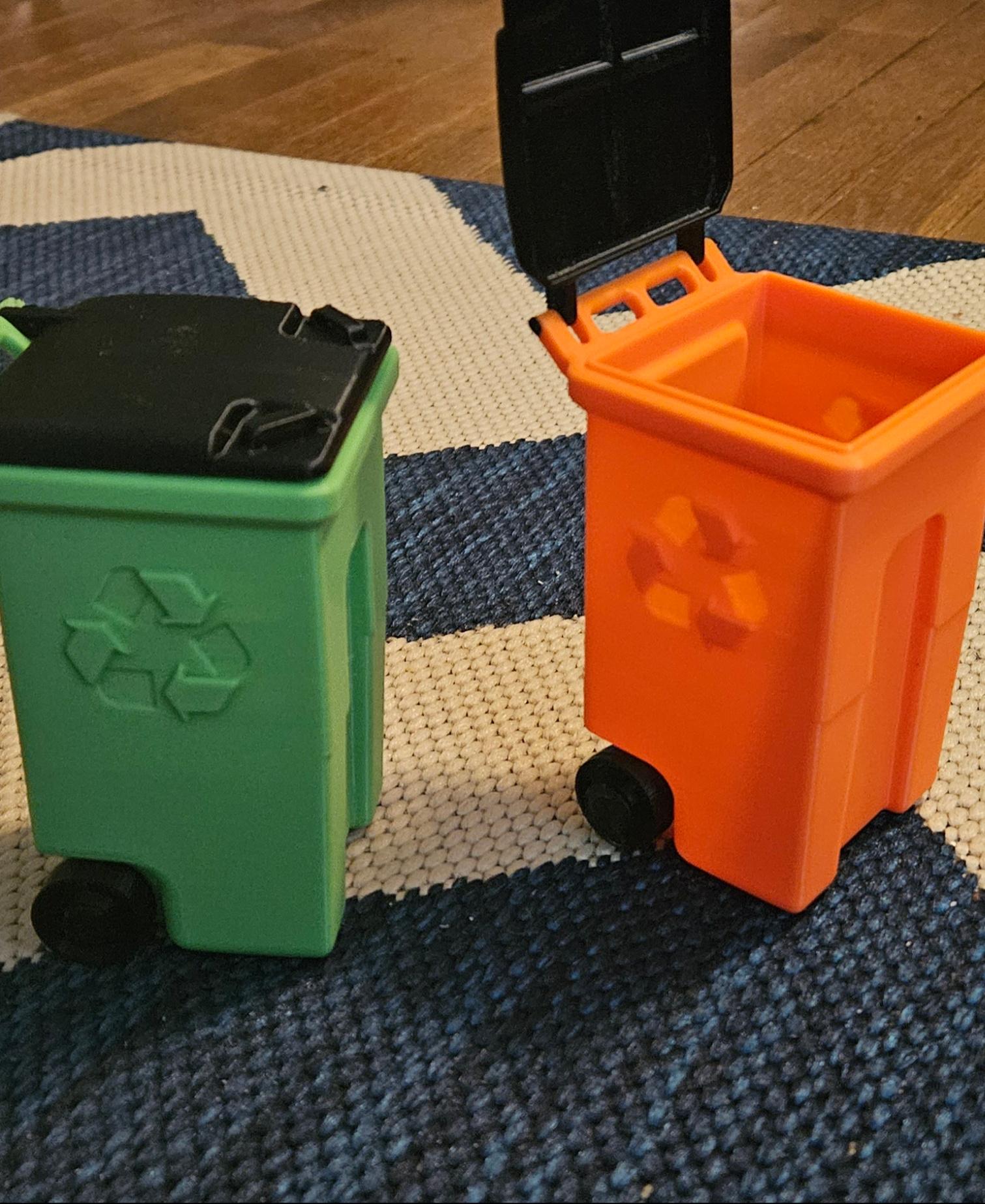 Mini Recycle Bin  - Printed at 65% scale. Had to run a small drill bit through the handle to get a piece of filament to fit. Melted both ends with a soldering iron to keep it in secure.  - 3d model