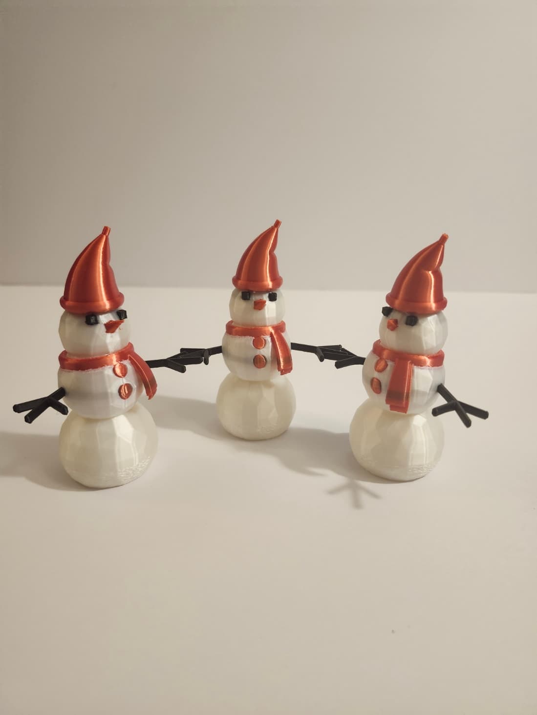 (IndyLLD on Twitch) Traditional snowmen with scarf, stocking cap, and arms.