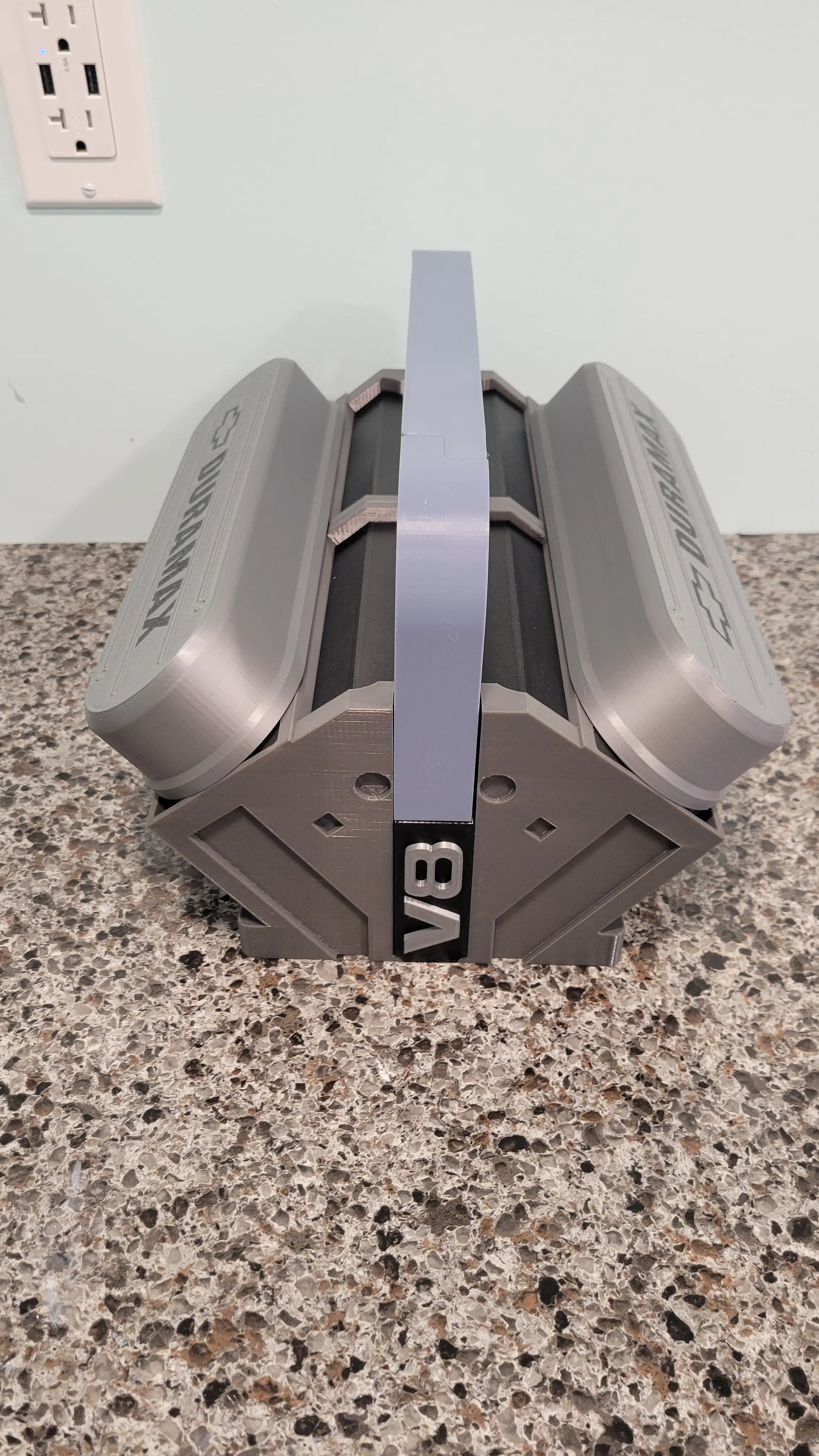 Printer V8 split version but used the regular V8 valve cover. It was resized to be the same size as the split valve cover. I also increased the height so that it would fully cover the cans. Lastly I modified it with a Chevy bowtie and Duramax lettering