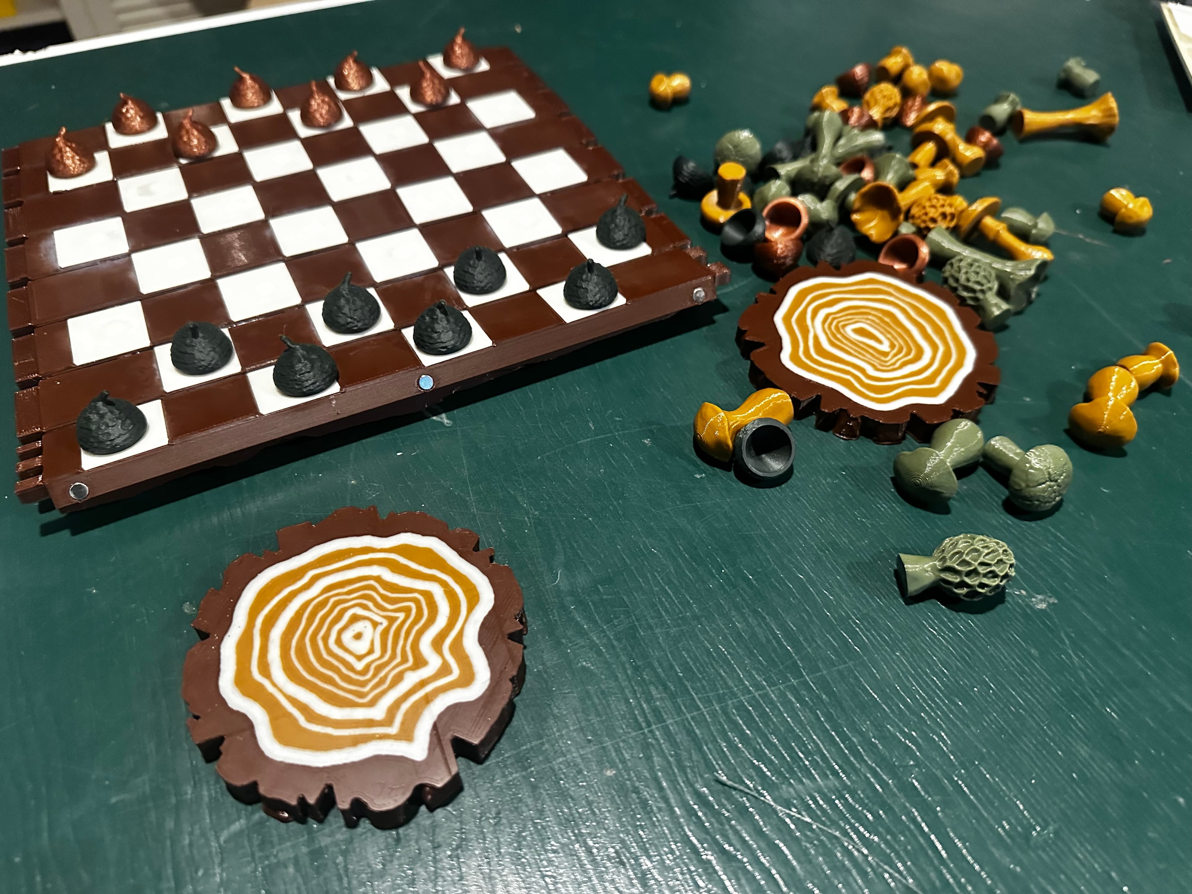 Printed on my MK4/MMU3. A fun print! I printed the log pieces horizontally with supports on the build plate only.
Assembly was easy. Like others have stated, log section 8 is very different from the other 7 pieces and it makes the board sit funny. The end caps are really snug but after working the edges of the caps/logs over with a file and a deburring tool it’s working well.
I would like an option to print the light colored squares all at once in the log sections using my MMU3 (or ams or whatever). It would look cleaner than glued in pieces.
Printed in IIIDMax PLA+ Brown, Coyote Brown, Vanilla Cream, Copper and Army Green and Eryone Matte Black Forest Green.
I didn’t realize that there was a version of the log ends that were already prepped for multicolor printing so I painted my ends in PrusaSlicer on my own and printed them in multicolor on my MMU3, they turned out great.