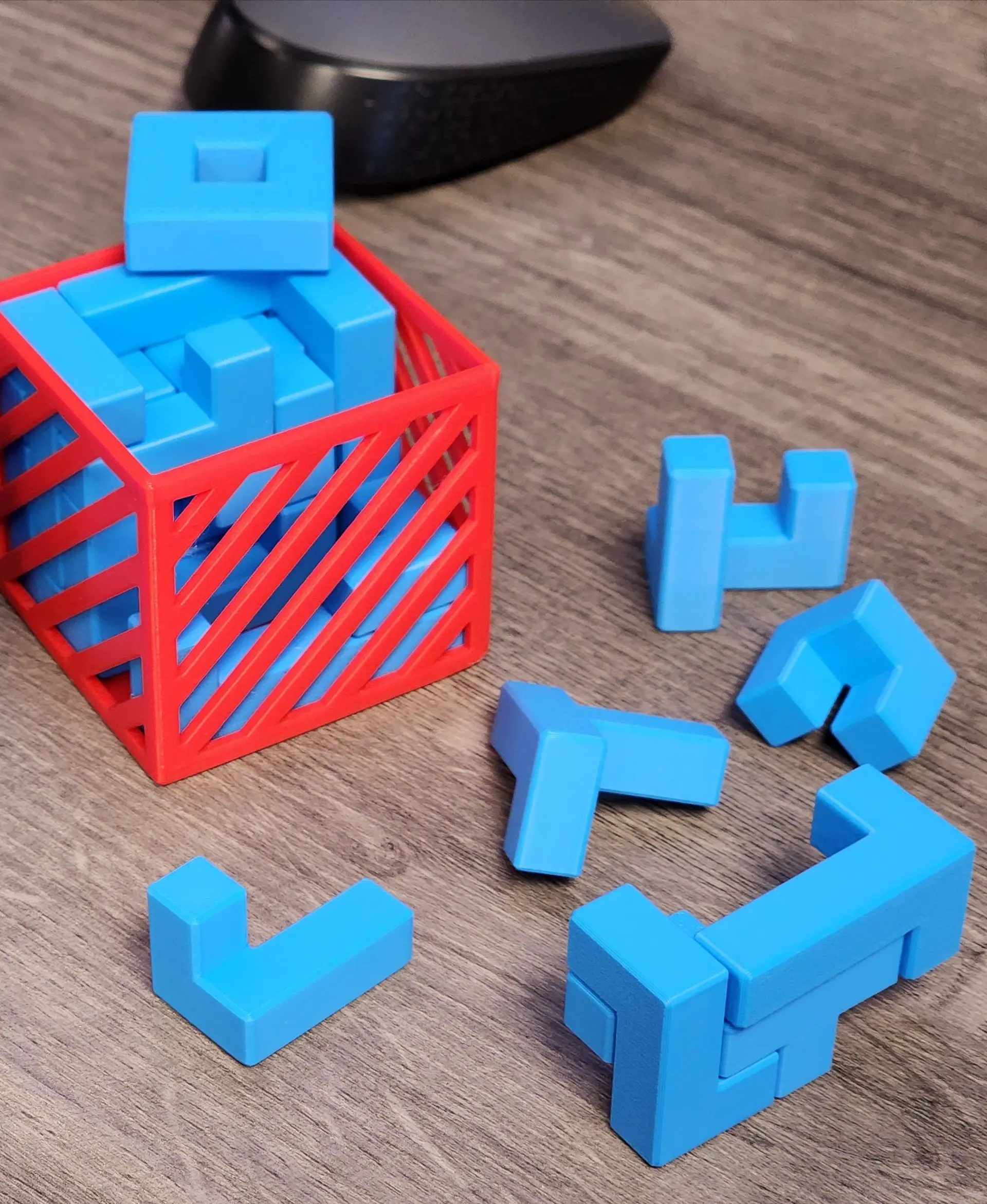 I think I've been trolled. All the pieces were printed at once as they were imported. I can see no way to complete this puzzle. The "solution" is of moderate help as it only shows the outside.
I quit. I'm calling this unsolvable.