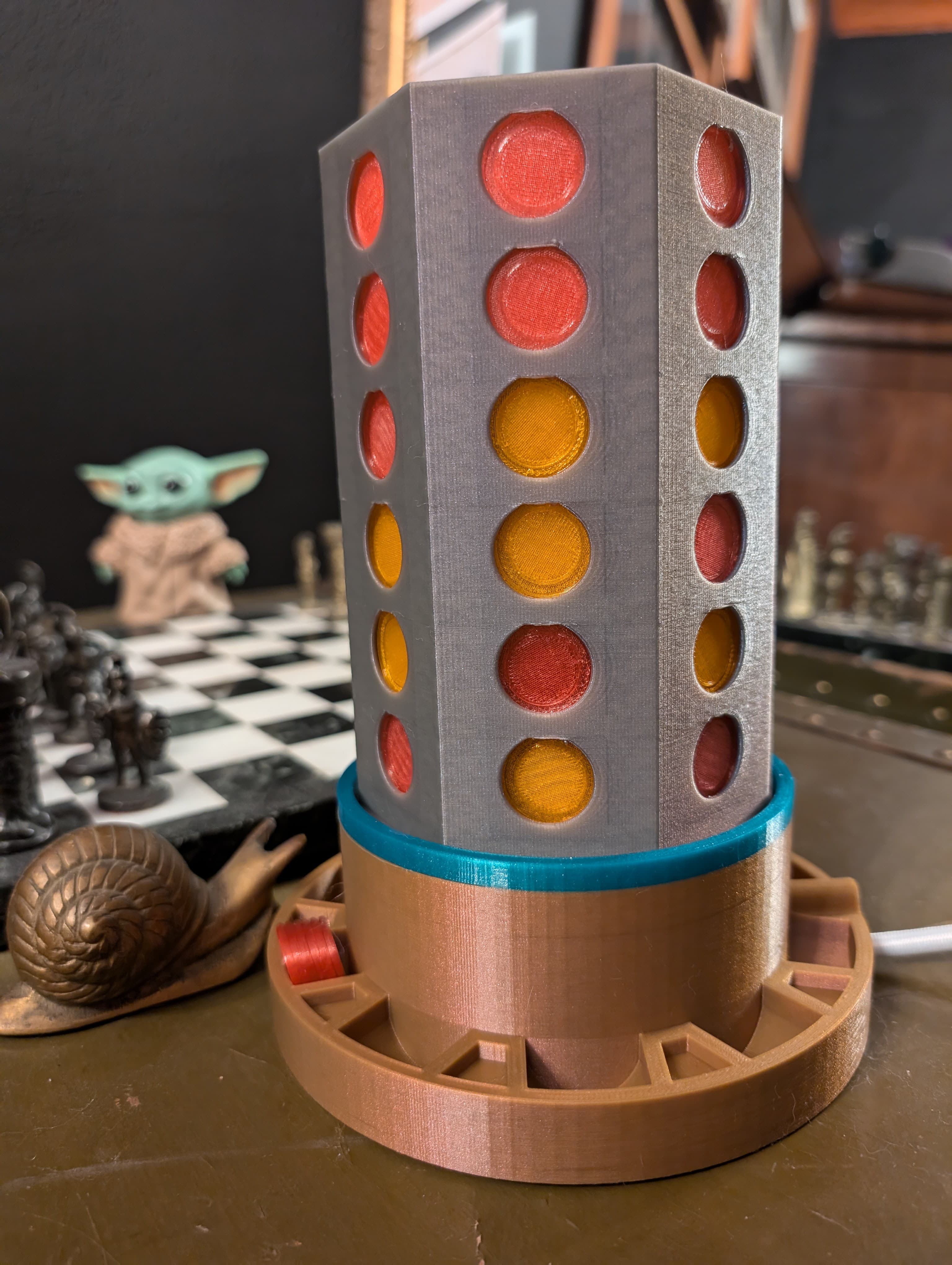 Another fun project. If I did it again, I'd use supports on the top part of the lamp as well. I used snug supports on the base. The tokens were difficult to print at the .1 suggestion, so I printed at .2. Tested with both an led white light and a black light bulb. I think it's pretty cool and should be a lot of fun at parties.