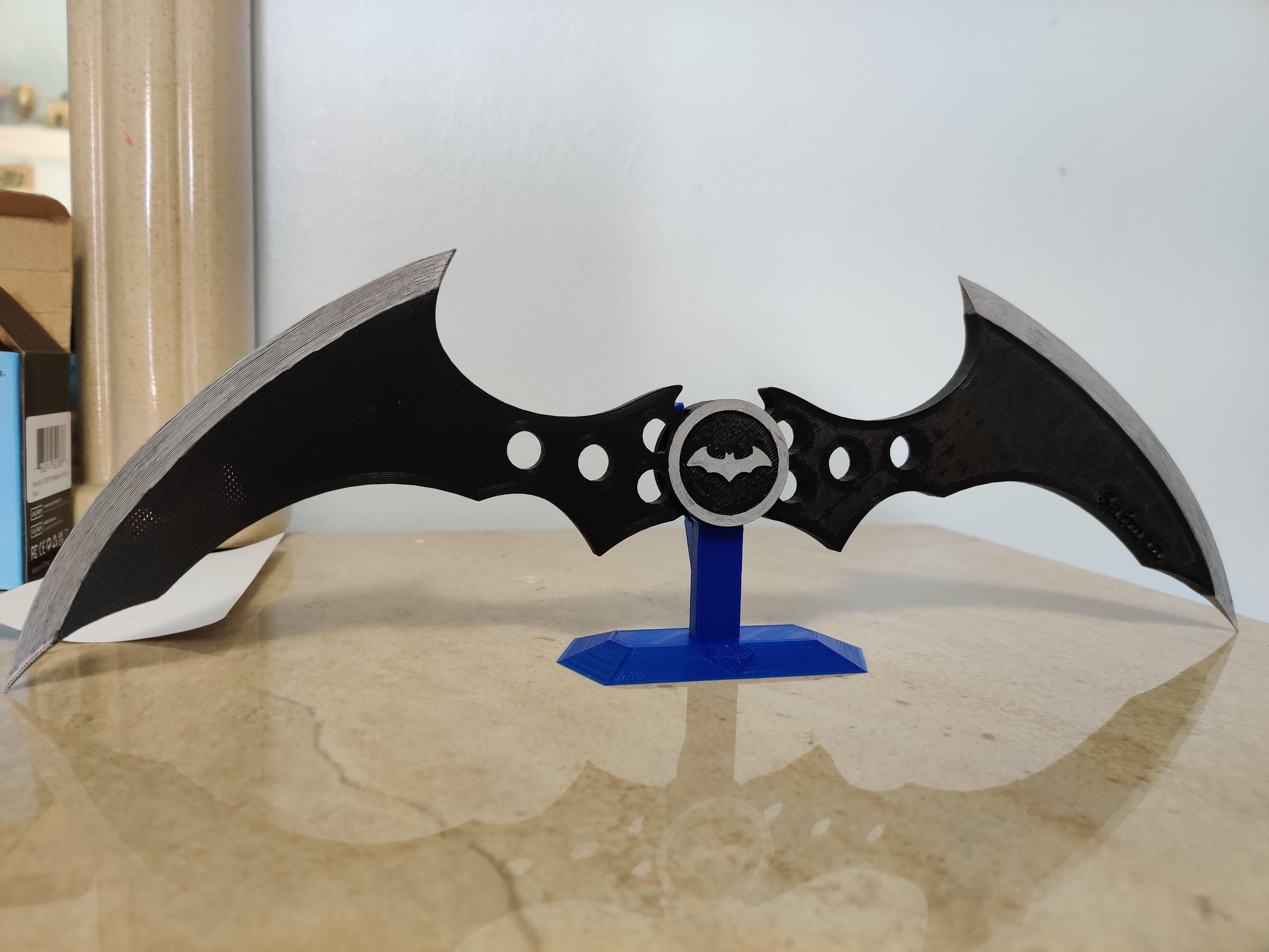 Batman Movable Blade (No Support Required) - cool print. made for a good gift. I didn't need any supports. I just increased the line width for the walls. I painted the silver with paint pens. And the stand I found on Thingiverse.  - 3d model