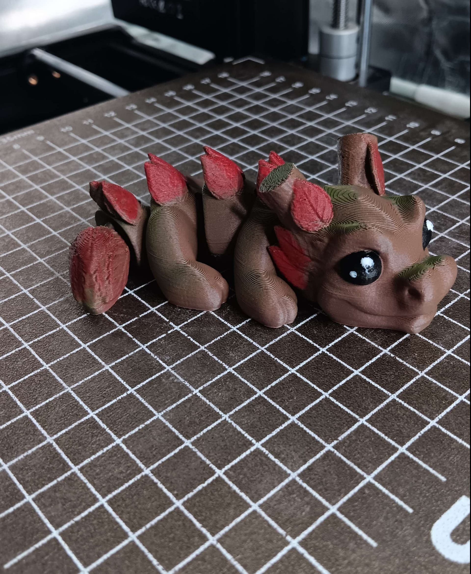 Printed in Polymaker's Camo Brown and Green. I did my best to add some red for like a Autumn Theme. He's still a cutie.