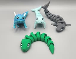 FLEXI FIDGET DESKTOP GUARDIANS TRICERATOPS, SHARK & DOLPHIN 3d model