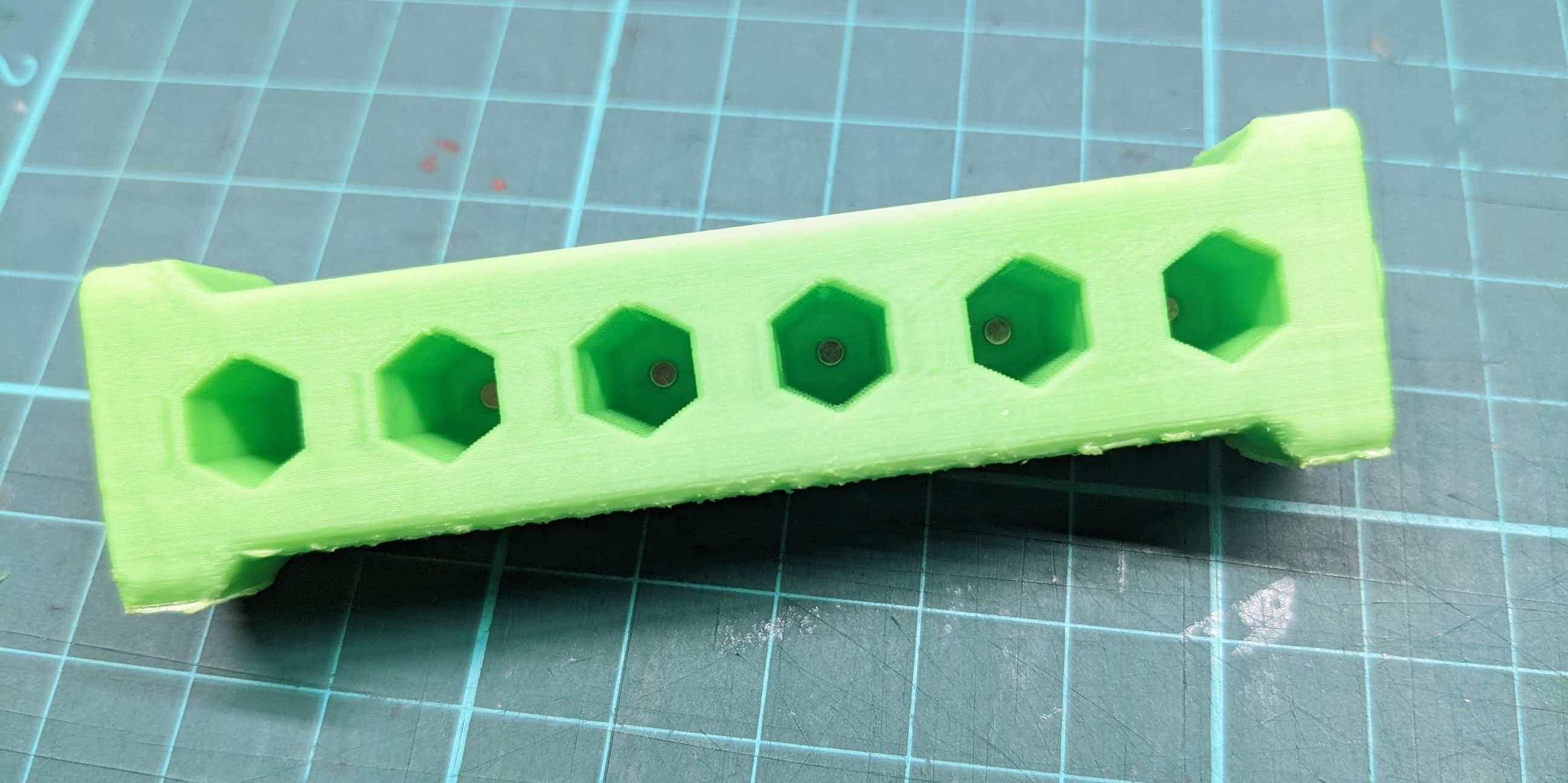 Suggest you can make a modify, add a magnet inside will be perfect!