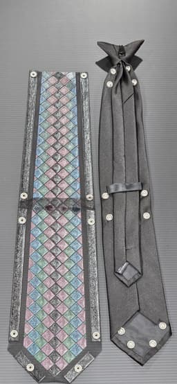 Diamond pattern tie cover with snap fasteners 3d model
